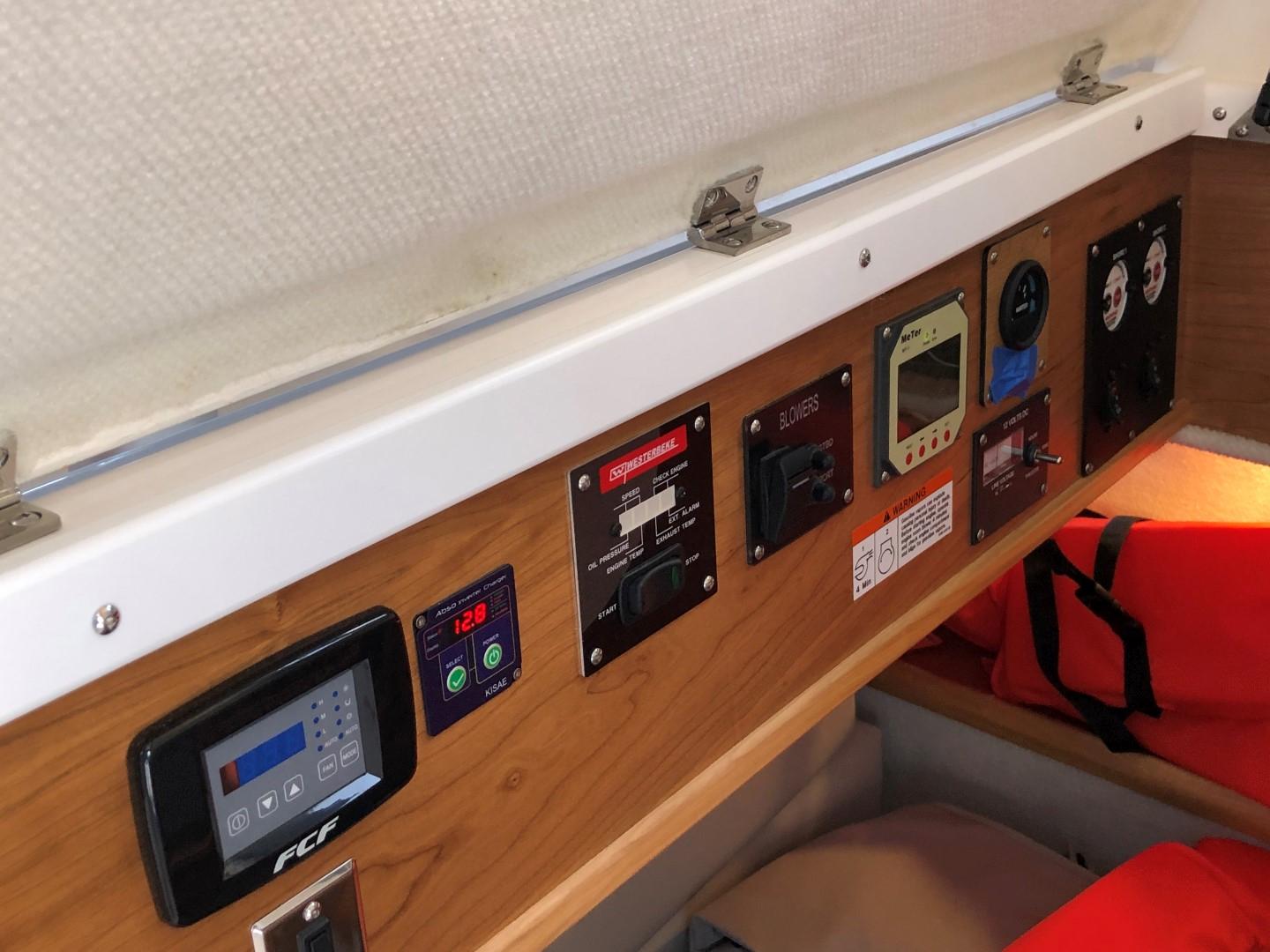 Cutwater-C-32 CB 2025-C32 CB 2025 FL-US-Control panel of 2025 Cutwater C-32 CB boat with various electronic displays and switches.-9832181 | Thumbnail