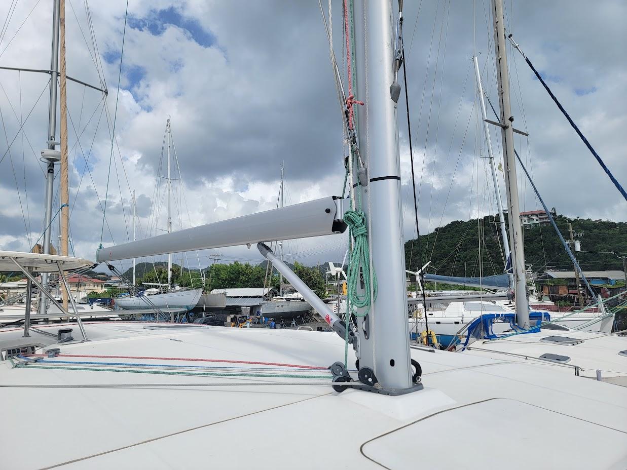 Leopard-44 2015-Kitten Caboodle SC-US-Sailboat deck view of 2015 Leopard 44, featuring mast and rigging under cloudy sky.-9762818 | Thumbnail