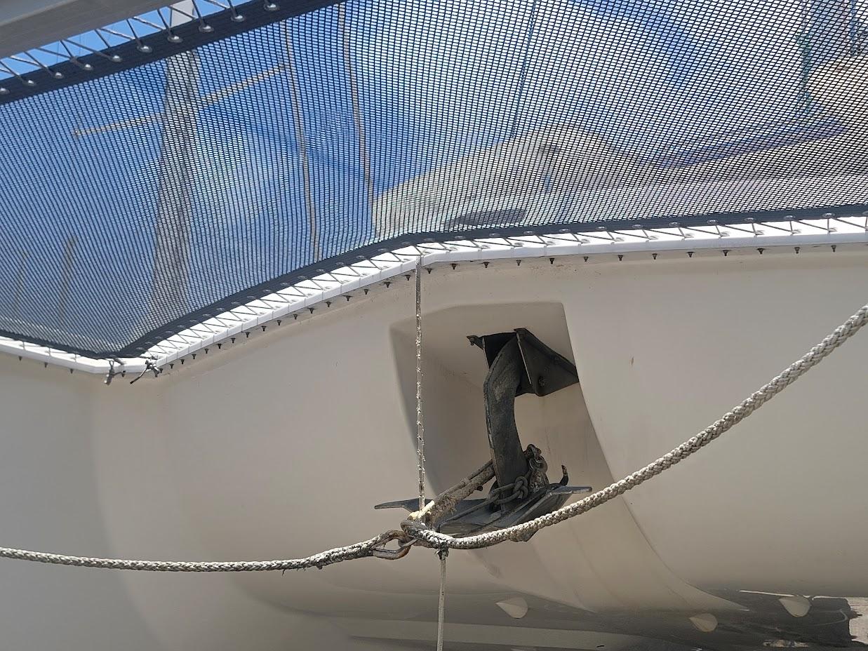 Leopard-44 2015-Kitten Caboodle SC-US-Leopard 44 catamaran anchor and netting, 2015 model, under clear blue sky.-9762818 | Thumbnail