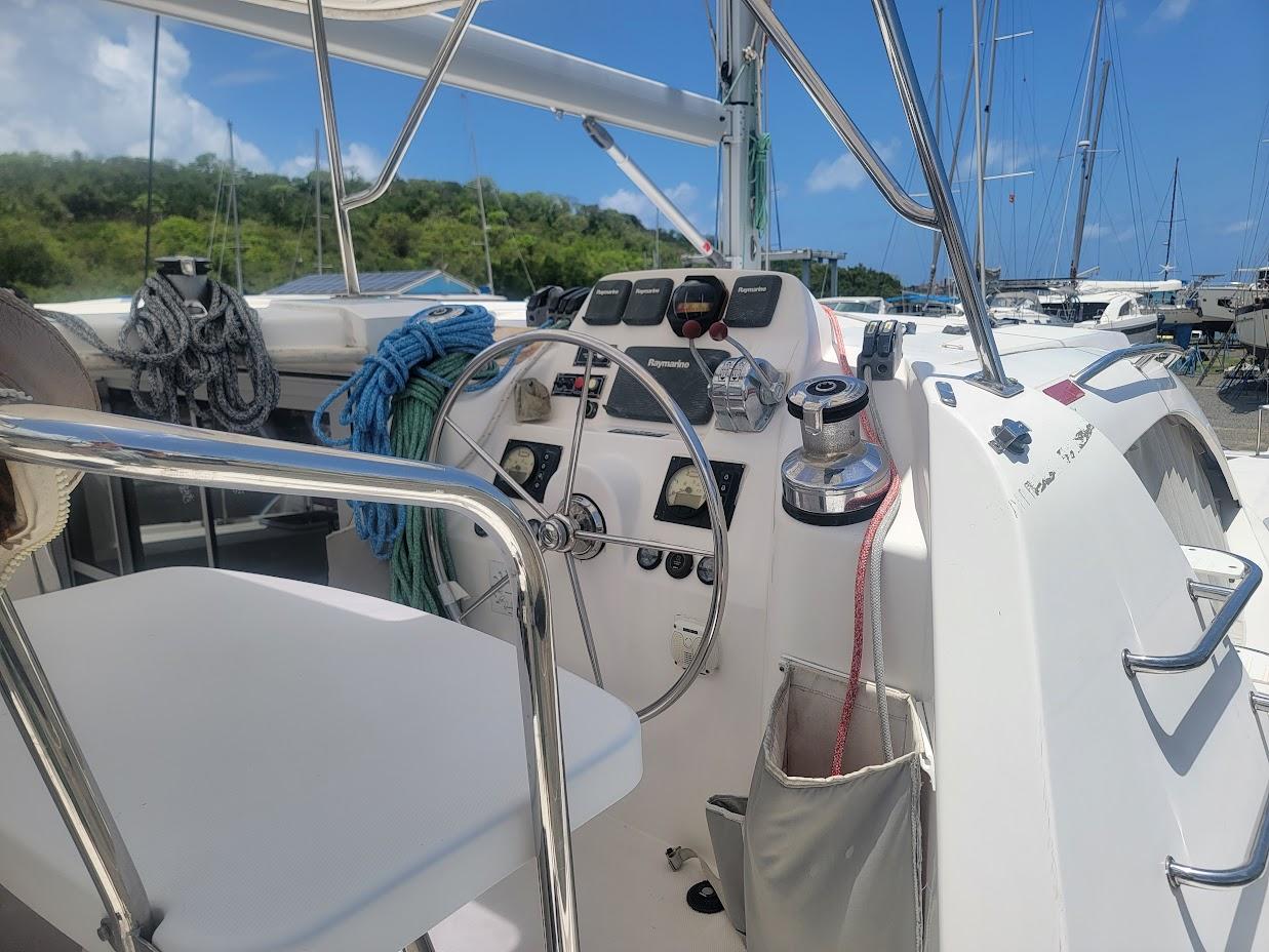 Leopard-44 2015-Kitten Caboodle SC-US-2015 Leopard 44 yacht cockpit with steering wheel and navigation controls.-9762818 | Thumbnail
