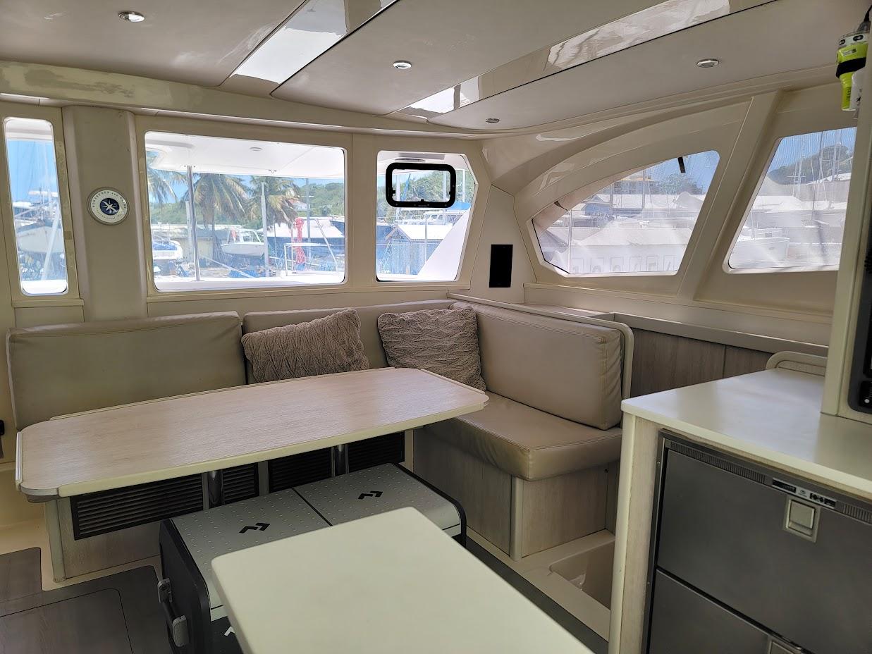 Leopard-44 2015-Kitten Caboodle SC-US-Interior of 2015 Leopard 44 catamaran with modern seating and large windows.-9762818 | Thumbnail