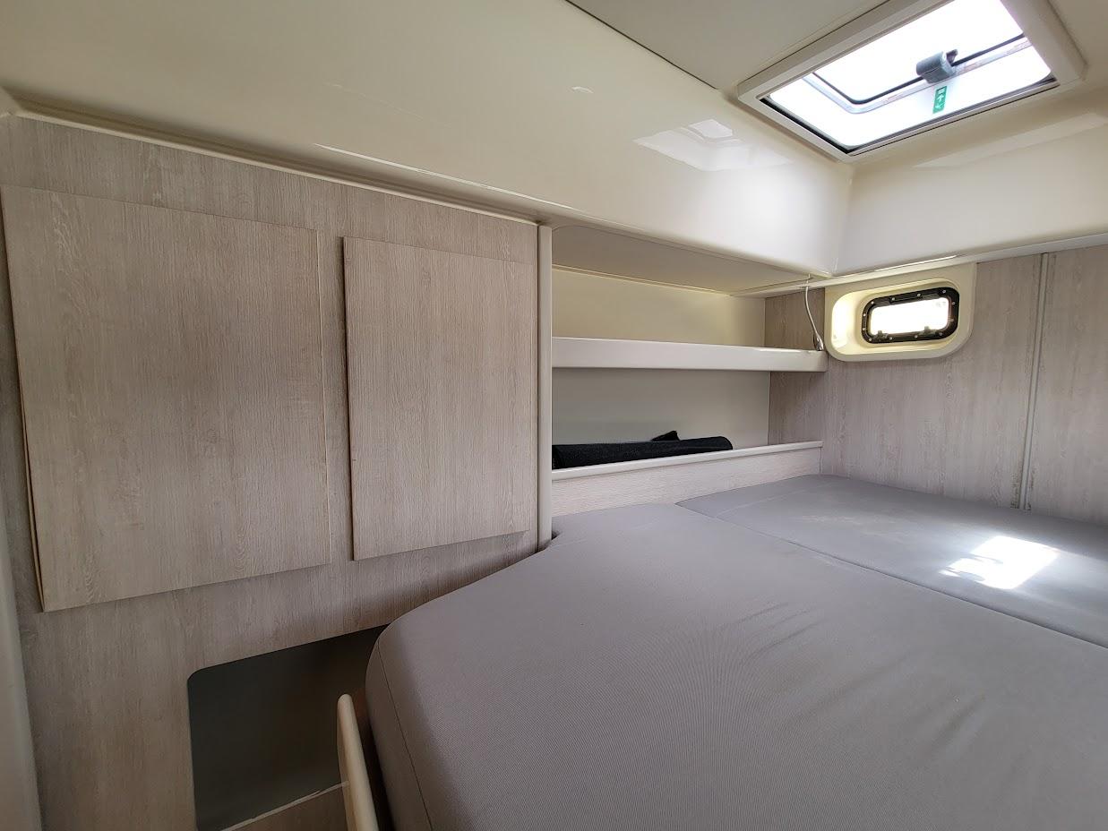 Leopard-44 2015-Kitten Caboodle SC-US-Cozy cabin interior of 2015 Leopard 44 yacht with bed, storage, and window.-9762818 | Thumbnail