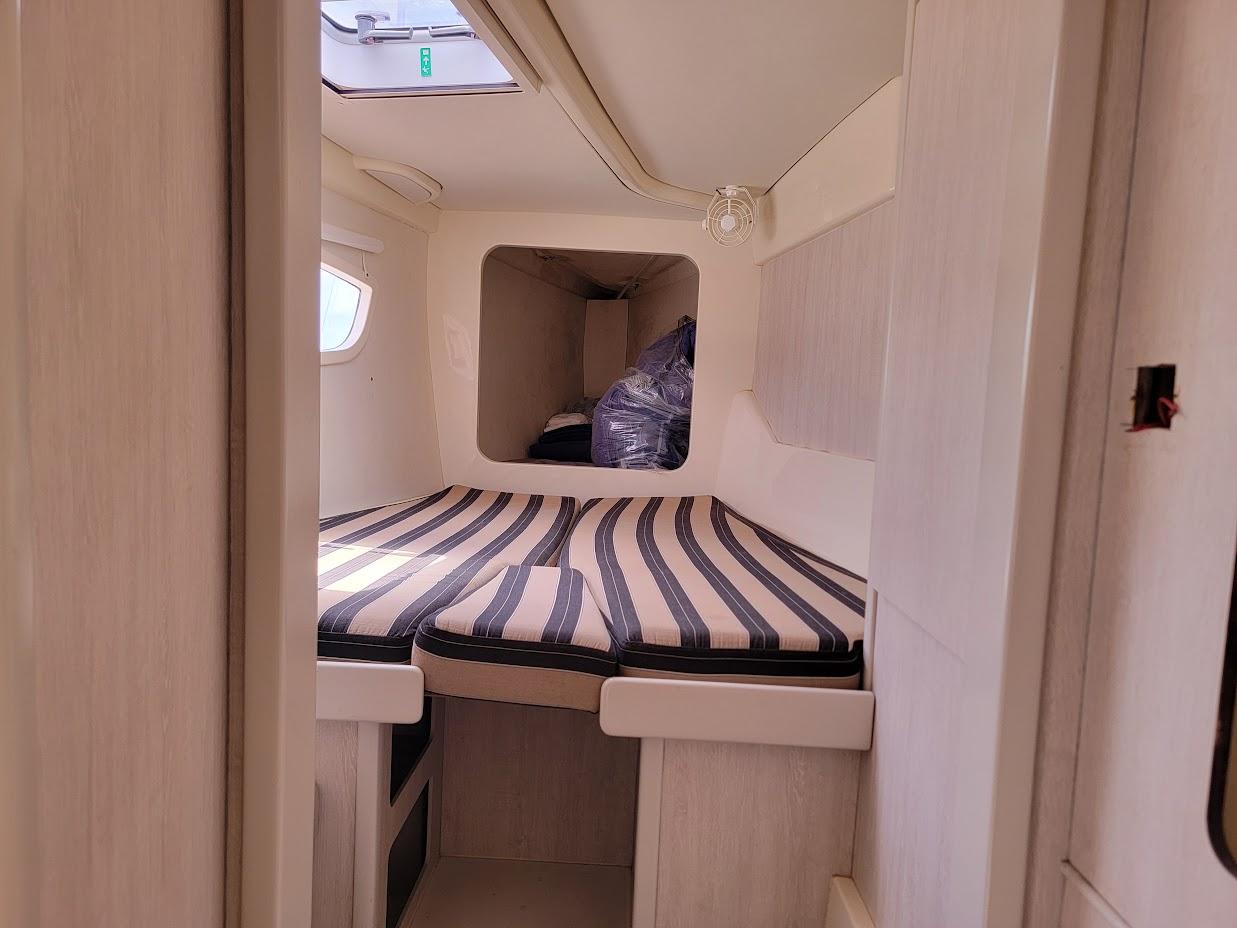 Leopard-44 2015-Kitten Caboodle SC-US-Cozy cabin interior of 2015 Leopard 44 yacht with striped bedding.-9762818 | Thumbnail