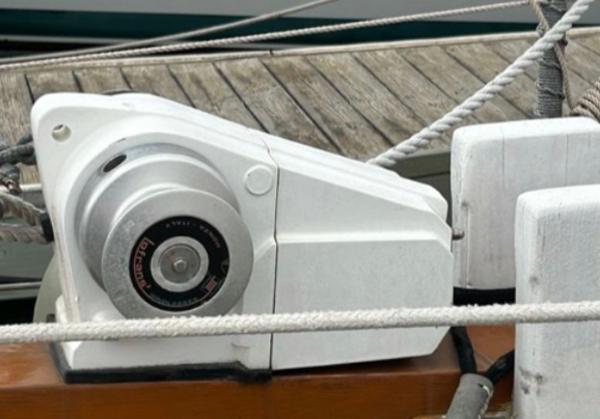 Winch on 1982 Bristol Channel Cutter 28 sailboat, docked with visible ropes and deck.