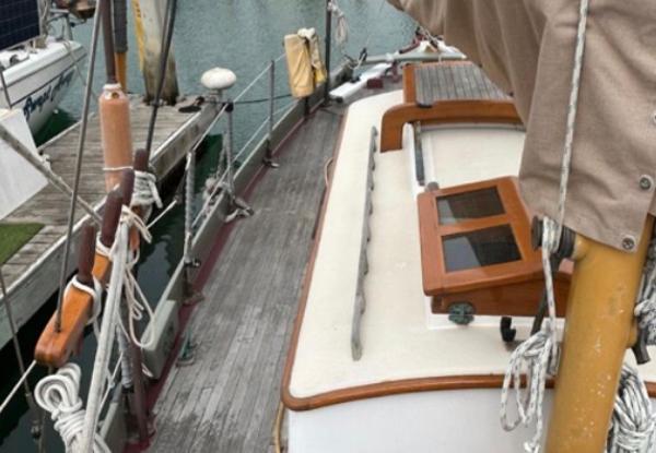 1982 Bristol Channel Cutter 28 sailboat docked, showcasing deck and rigging details.
