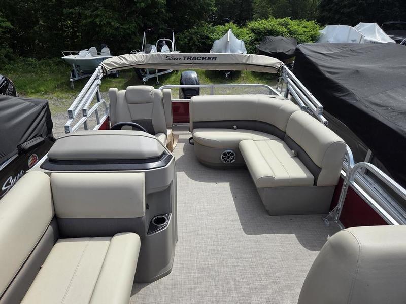 2025 Sun Tracker PB 18 DLX pontoon boat with spacious seating and modern design.