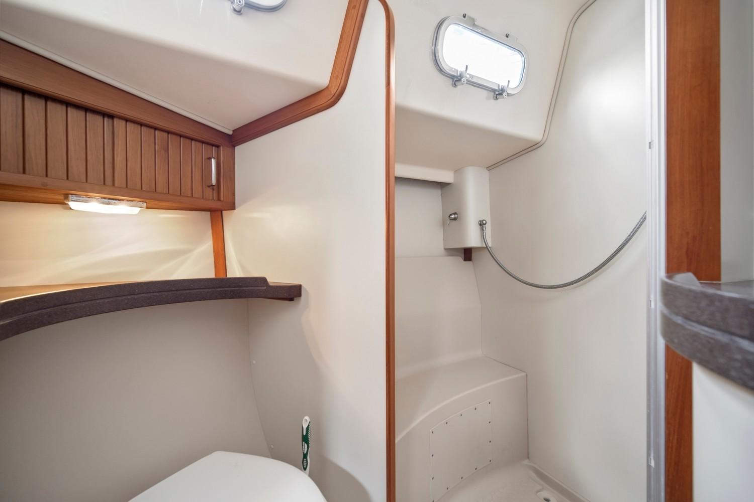 Shower stall with seat