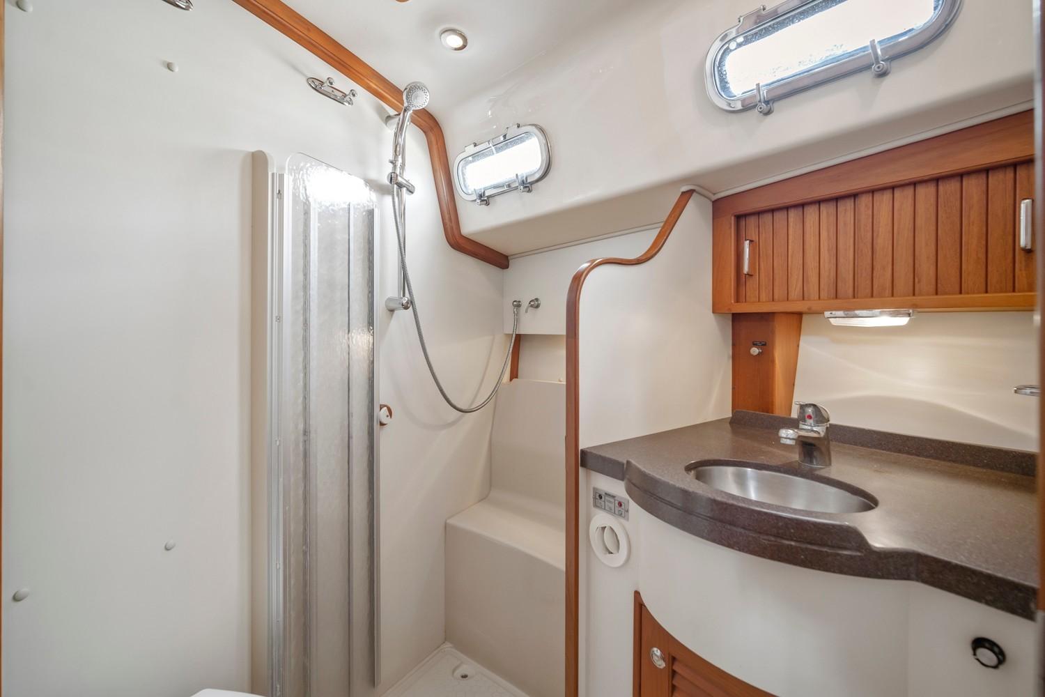 Forward head with shower stall