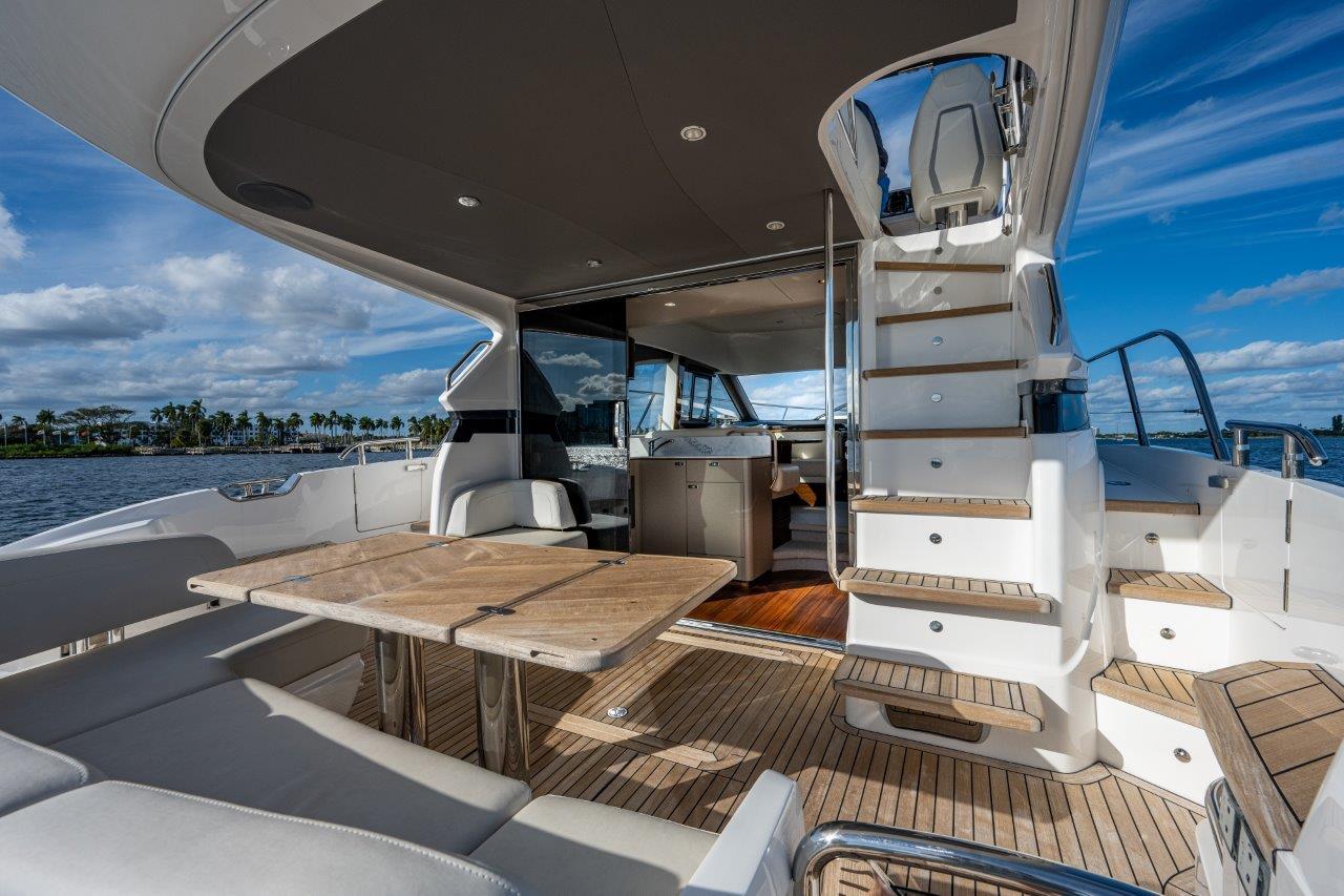 Princess F45 Happy Hours-Aft Deck, Table, Seating and Stairs to Flybridge