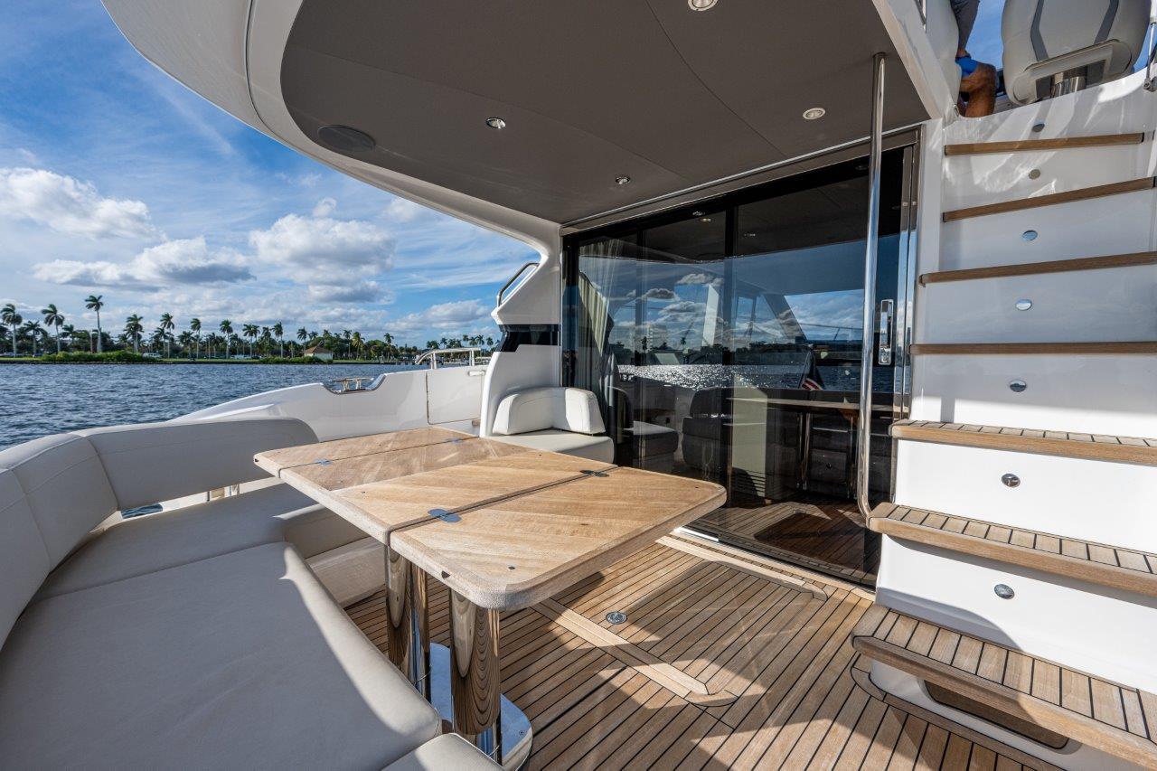 Princess F45 Happy Hours-Aft Deck, Table, Seating and Stairs to Flybridge