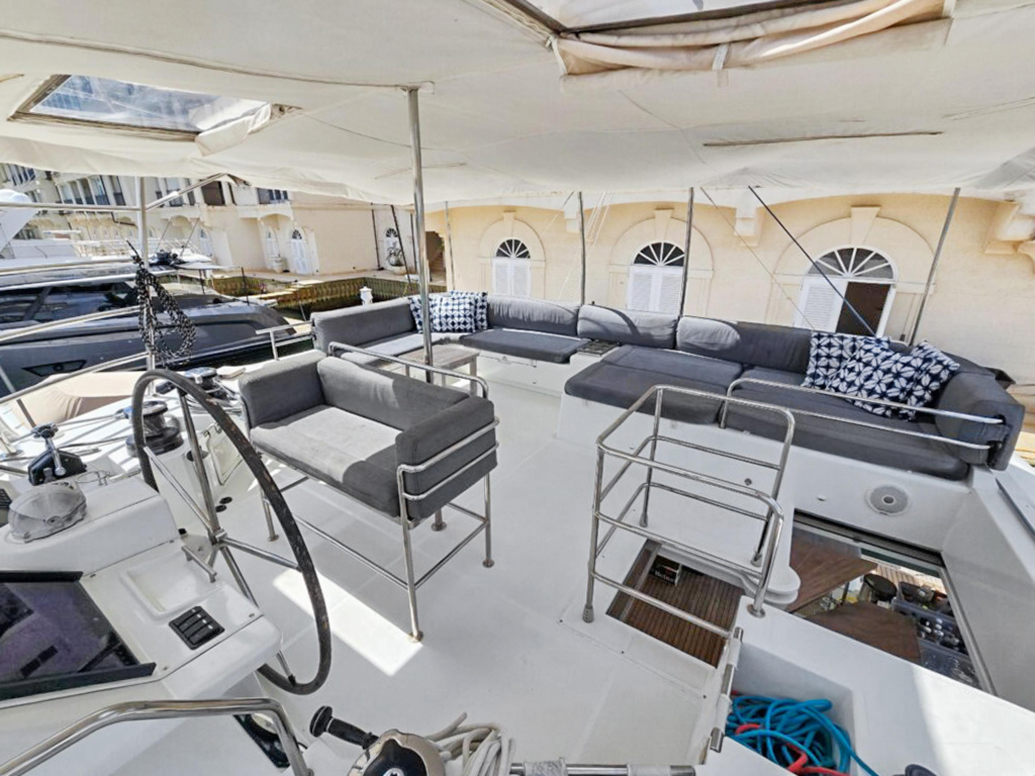 Lagoon-560 S2 2015-Cool Runnings IV SC-US-Luxurious 2015 Lagoon 560 S2 yacht with spacious seating and modern helm station.-9782915 | Thumbnail