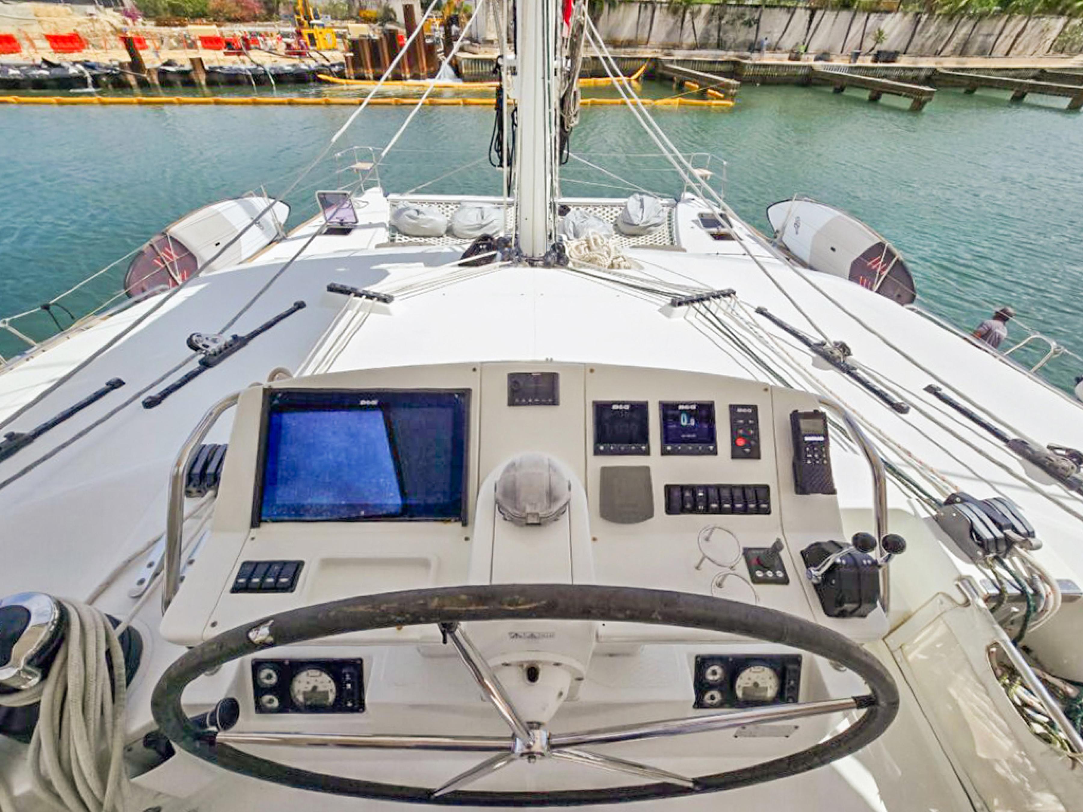 Lagoon-560 S2 2015-Cool Runnings IV SC-US-Helm of 2015 Lagoon 560 S2 yacht with navigation instruments and steering wheel.-9782915 | Thumbnail