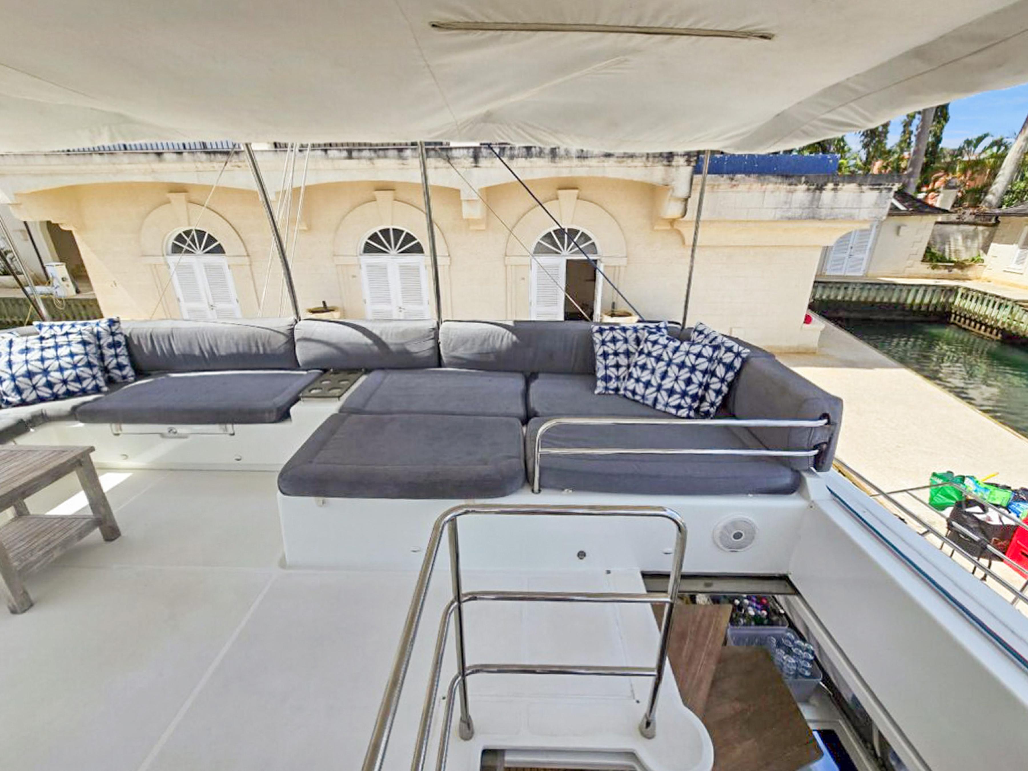 Lagoon-560 S2 2015-Cool Runnings IV SC-US-Luxurious Lagoon 560 S2 yacht deck with comfortable seating, 2015 model.-9782915 | Thumbnail