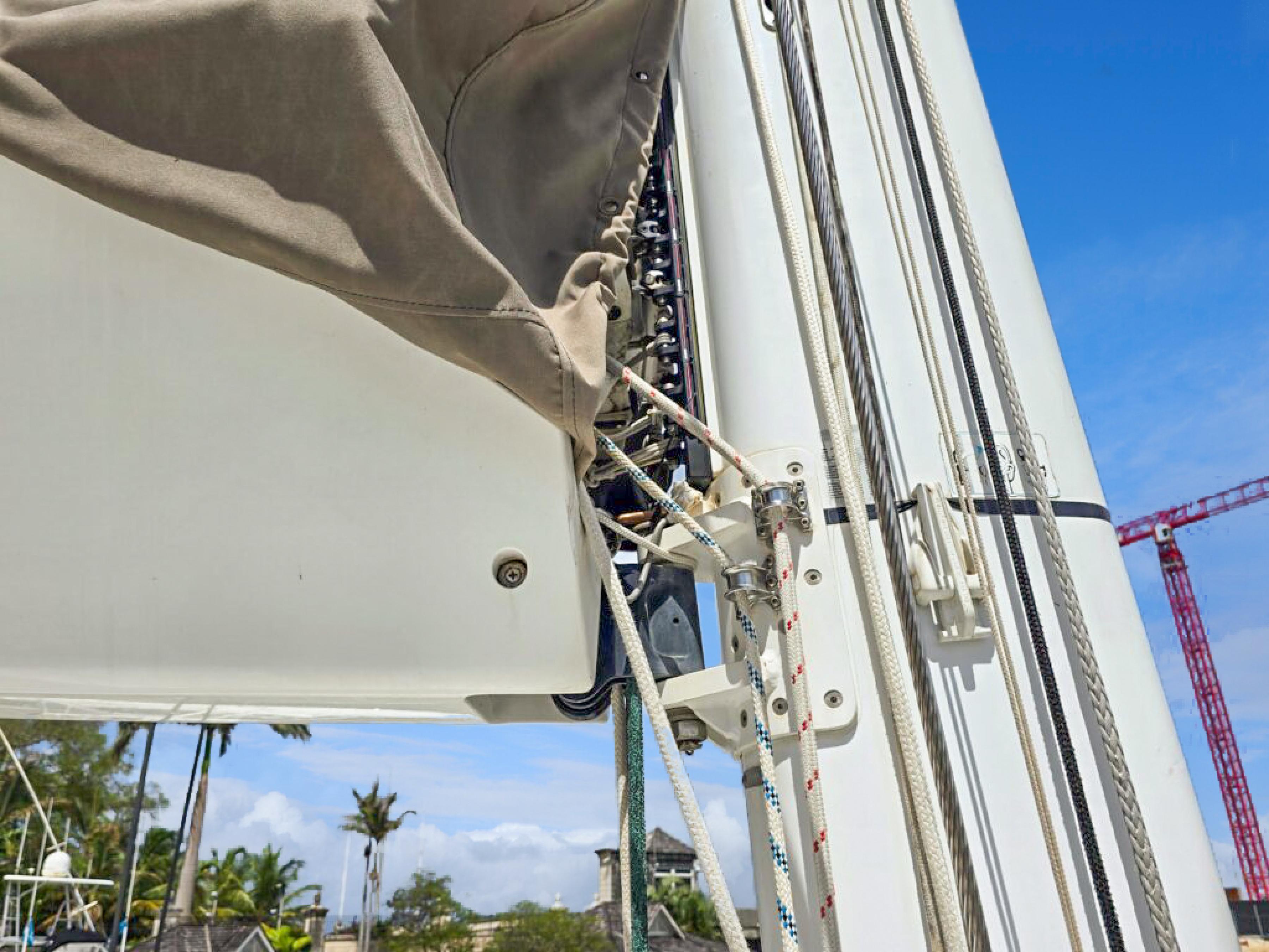 Lagoon-560 S2 2015-Cool Runnings IV SC-US-Close-up of a 2015 Lagoon 560 S2 sailboat mast and rigging against a blue sky.-9782915 | Thumbnail