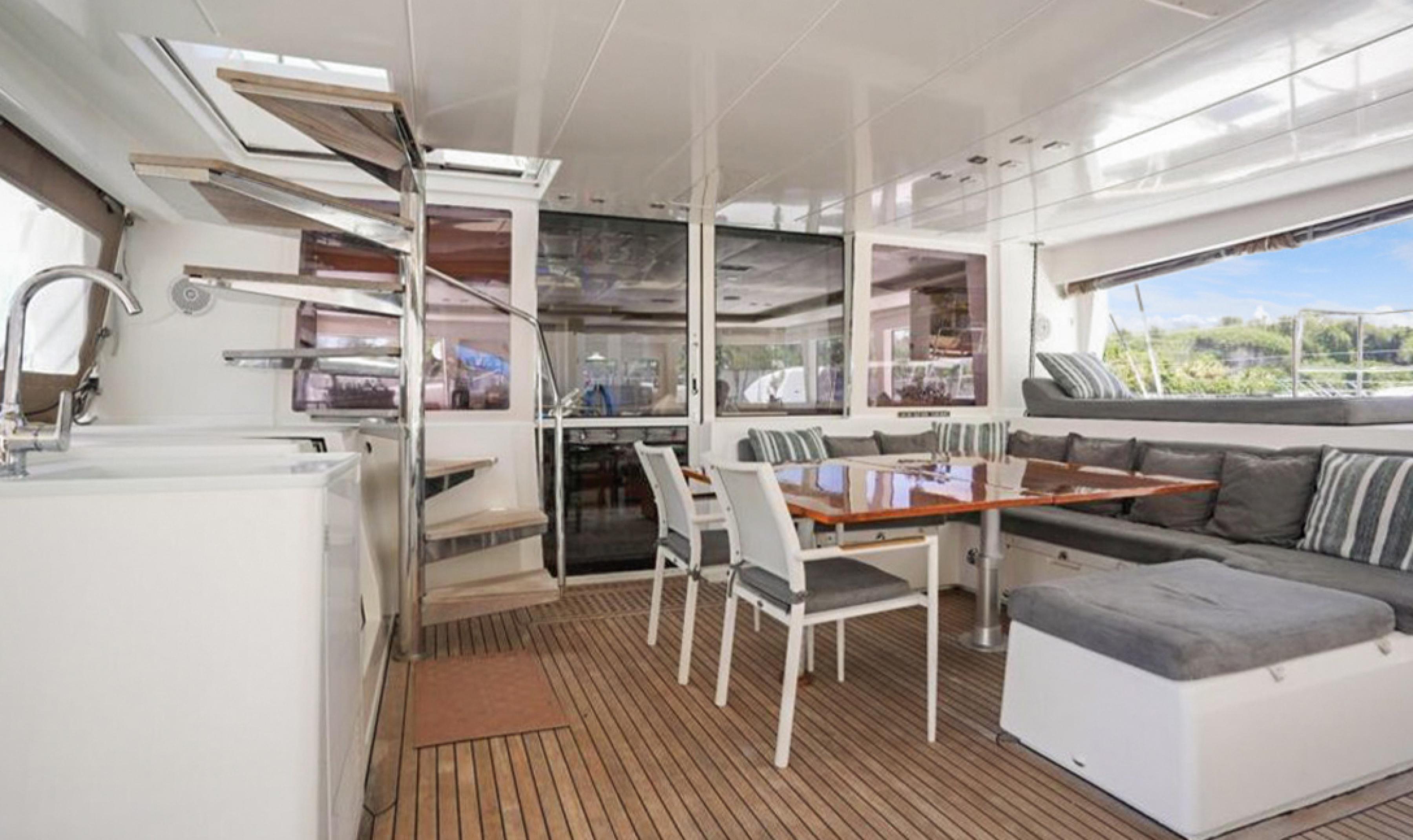 Lagoon-560 S2 2015-Cool Runnings IV SC-US-Interior of 2015 Lagoon 560 S2 yacht with modern seating and dining area.-9782915 | Thumbnail