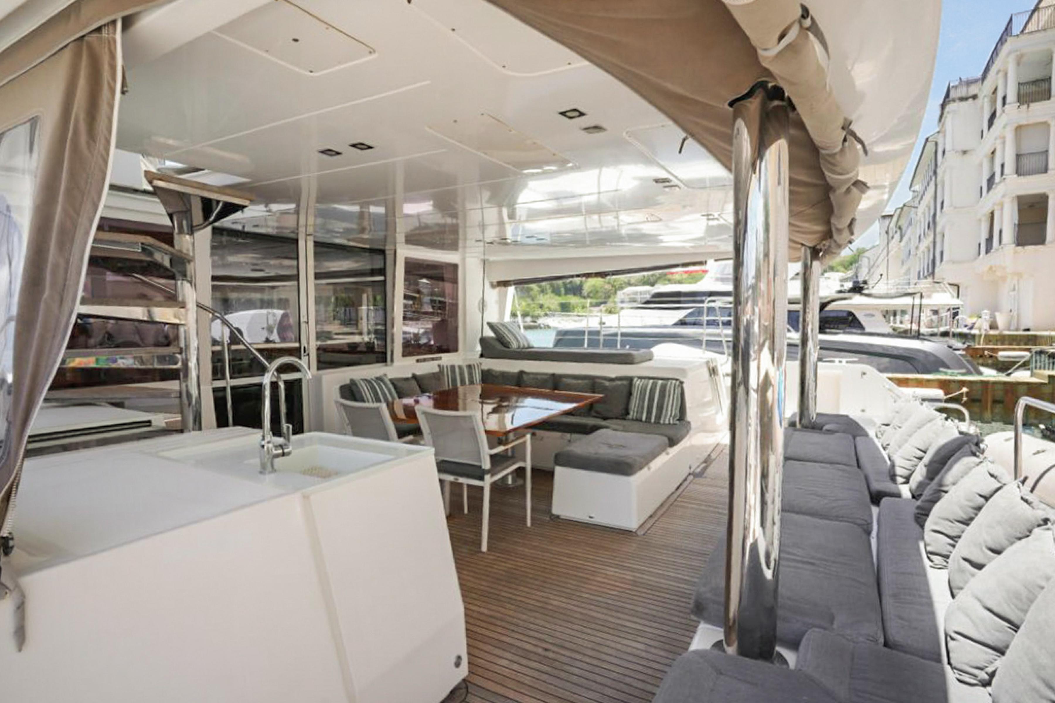 Lagoon-560 S2 2015-Cool Runnings IV SC-US-Luxurious 2015 Lagoon 560 S2 yacht interior with spacious seating and modern amenities.-9782915 | Thumbnail