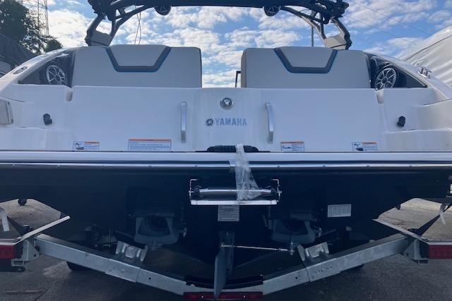 2021 Yamaha Boats 252XE rear view, showcasing sleek design and dual seating.