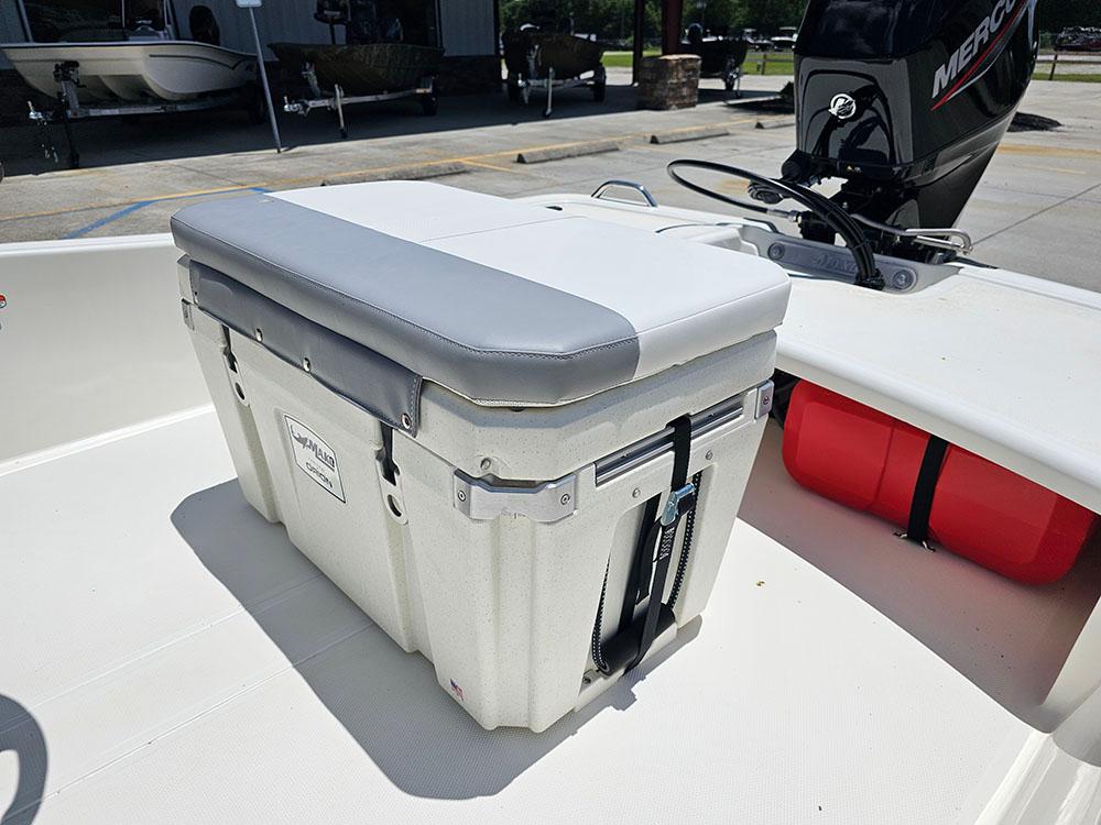 2025 Mako Pro Skiff 15 CC boat with cushioned cooler and Mercury engine.