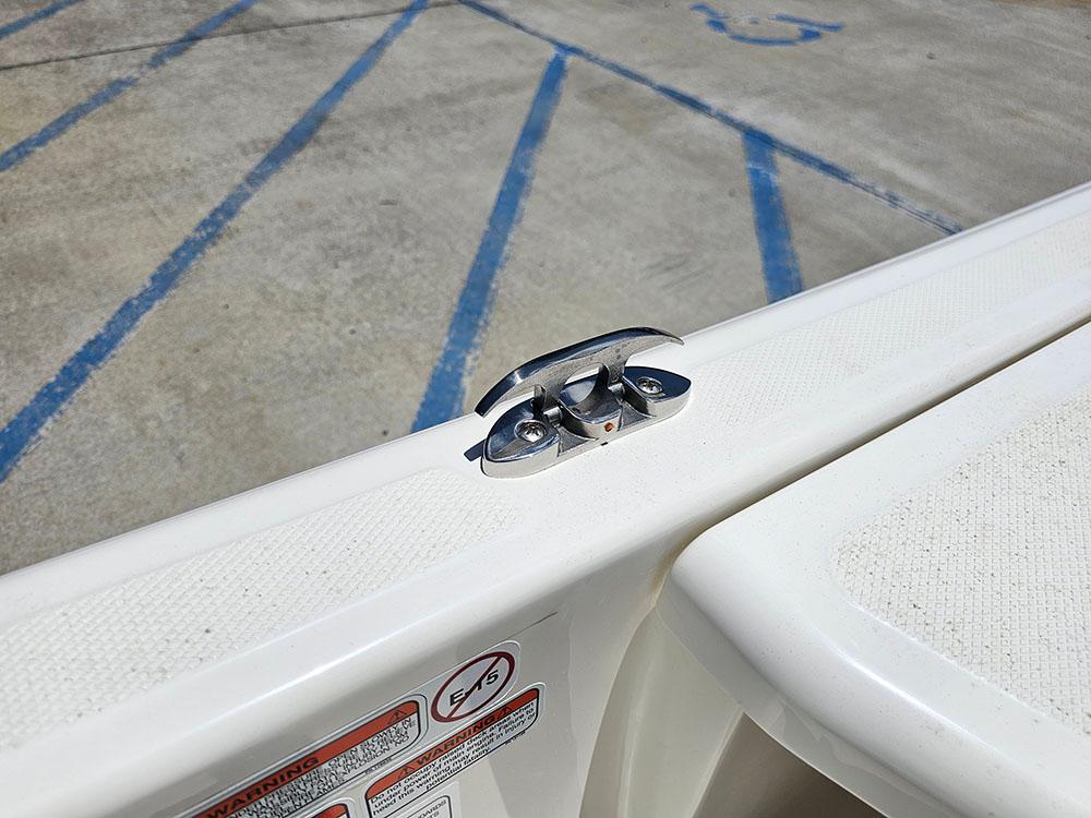 2025 Mako Pro Skiff 15 CC boat cleat on white deck, close-up view.