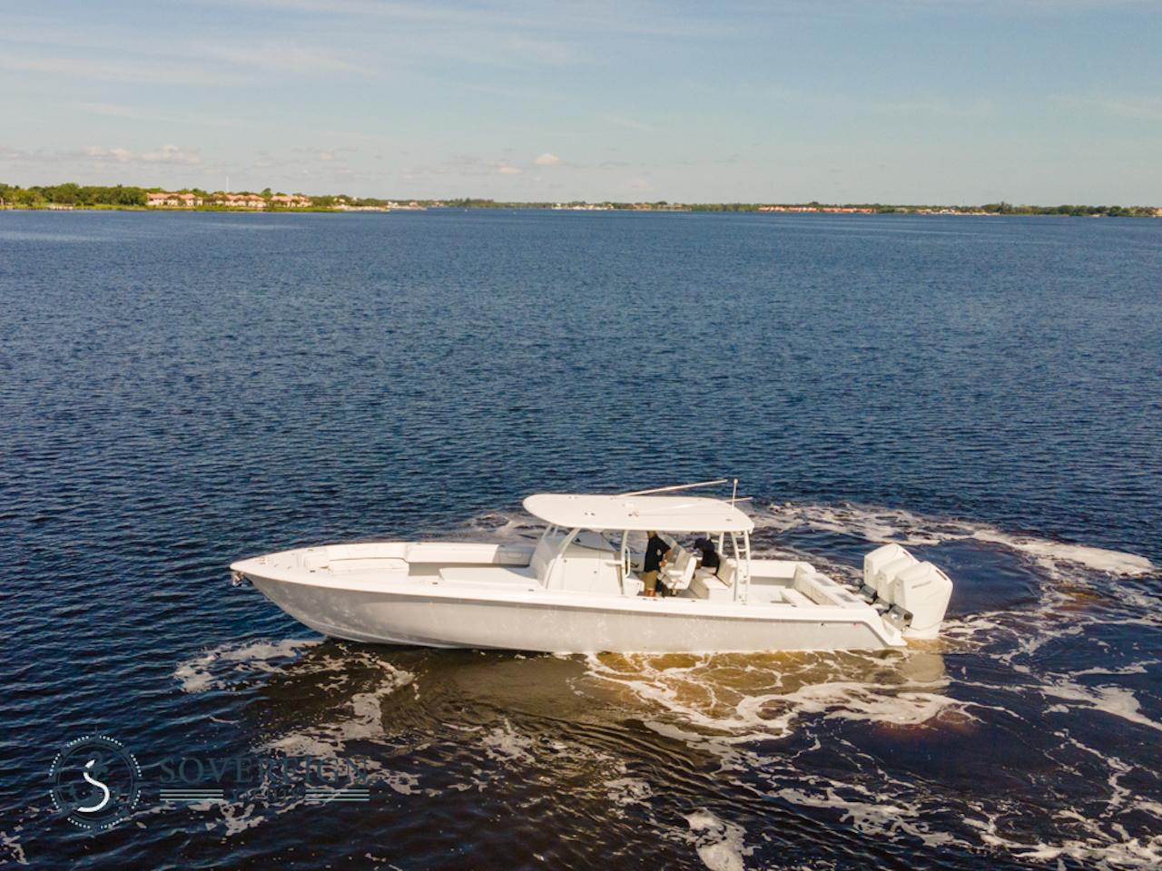 Contender-44 CB 2024-JDJ4C023C324 FL-US-2024 Contender 44 CB boat cruising on a calm lake.-8992982 | Thumbnail