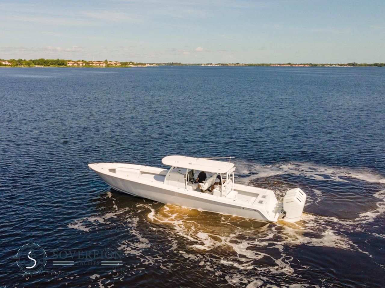 Contender-44 CB 2024-JDJ4C023C324 FL-US-2024 Contender 44 CB boat cruising on a calm lake.-8992982 | Thumbnail