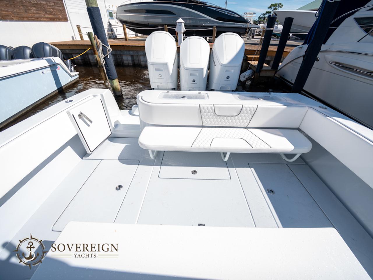 Contender-44 CB 2024-JDJ4C023C324 FL-US-2024 Contender 44 CB yacht deck with triple outboard engines.-8992982 | Thumbnail
