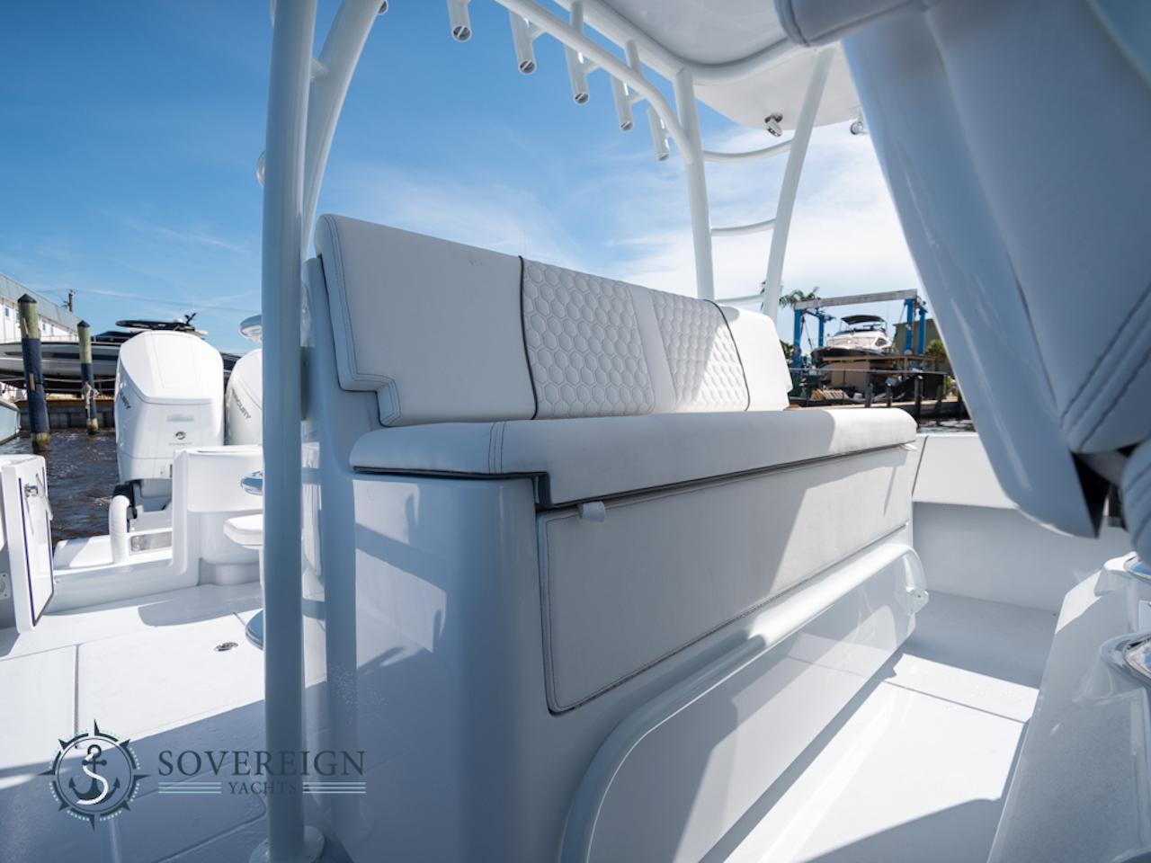 Contender-44 CB 2024-JDJ4C023C324 FL-US-2024 Contender 44 CB boat interior with white cushioned seating.-8992982 | Thumbnail