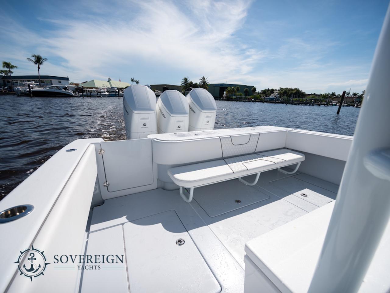 Contender-44 CB 2024-JDJ4C023C324 FL-US-2024 Contender 44 CB boat with triple outboard engines on a sunny day.-8992982 | Thumbnail