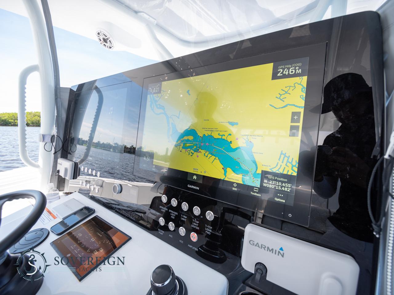 Contender-44 CB 2024-JDJ4C023C324 FL-US-2024 Contender 44 CB boat dashboard with Garmin navigation system.-8992982 | Thumbnail