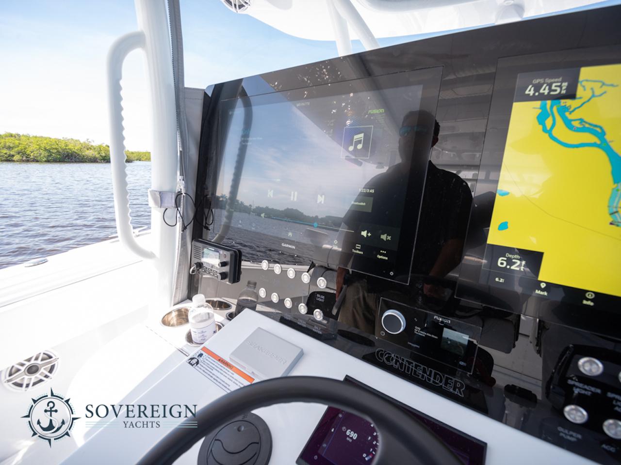Contender-44 CB 2024-JDJ4C023C324 FL-US-2024 Contender 44 CB yacht dashboard with navigation and control systems, Sovereign Yachts logo.-8992982 | Thumbnail