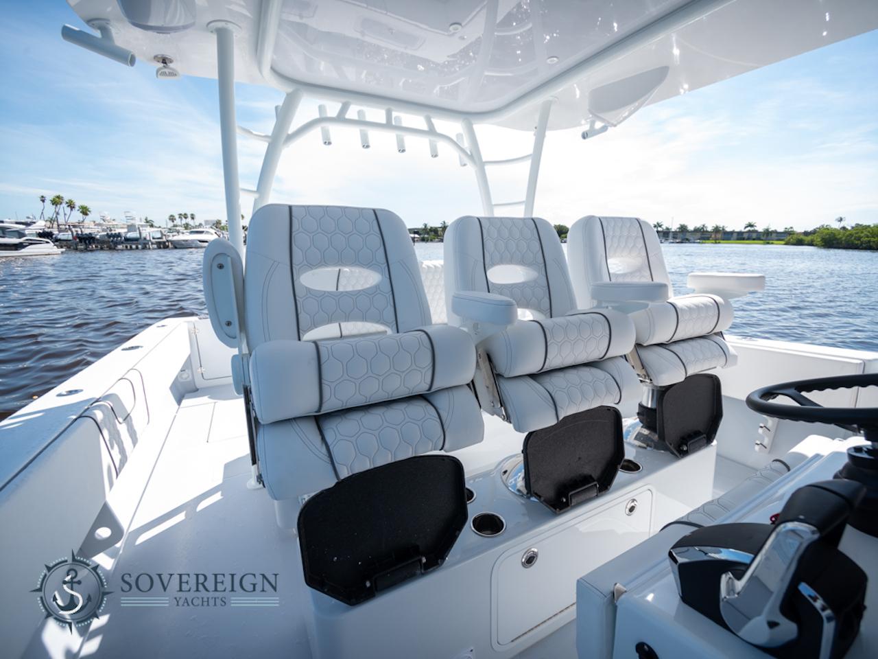Contender-44 CB 2024-JDJ4C023C324 FL-US-2024 Contender 44 CB boat interior with luxurious seating, Sovereign Yachts logo.-8992982 | Thumbnail