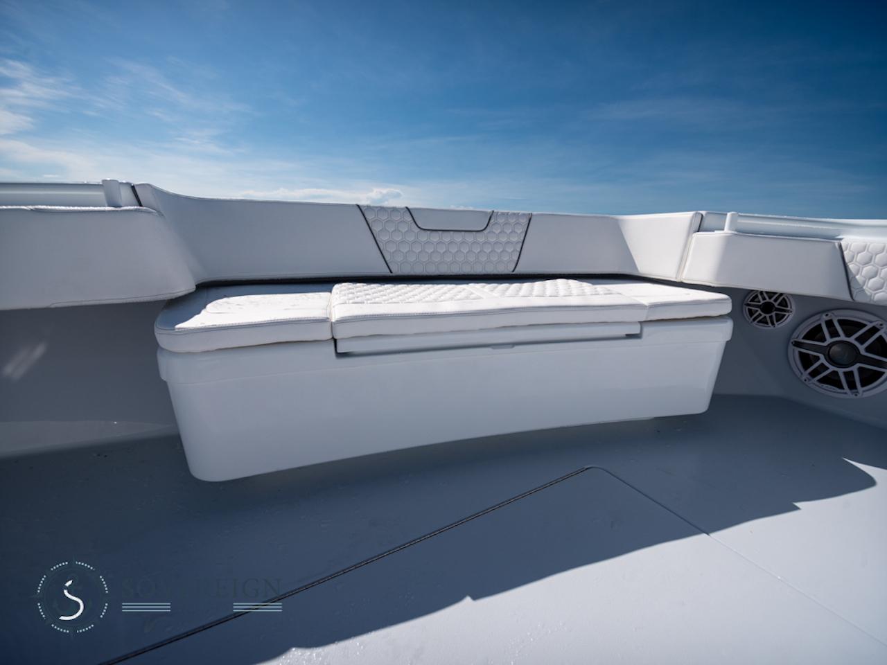 Contender-44 CB 2024-JDJ4C023C324 FL-US-Contender 44 CB 2024 boat interior with cushioned seating and storage.-8992982 | Thumbnail