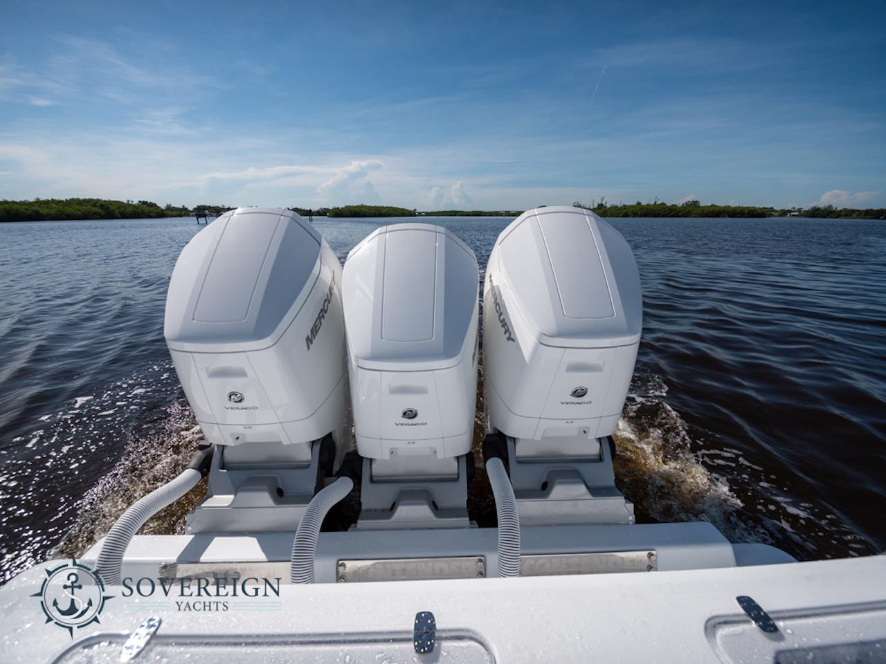 Contender-44 CB 2024-JDJ4C023C324 FL-US-2024 Contender 44 CB with triple outboard engines on the water.-8992982 | Thumbnail