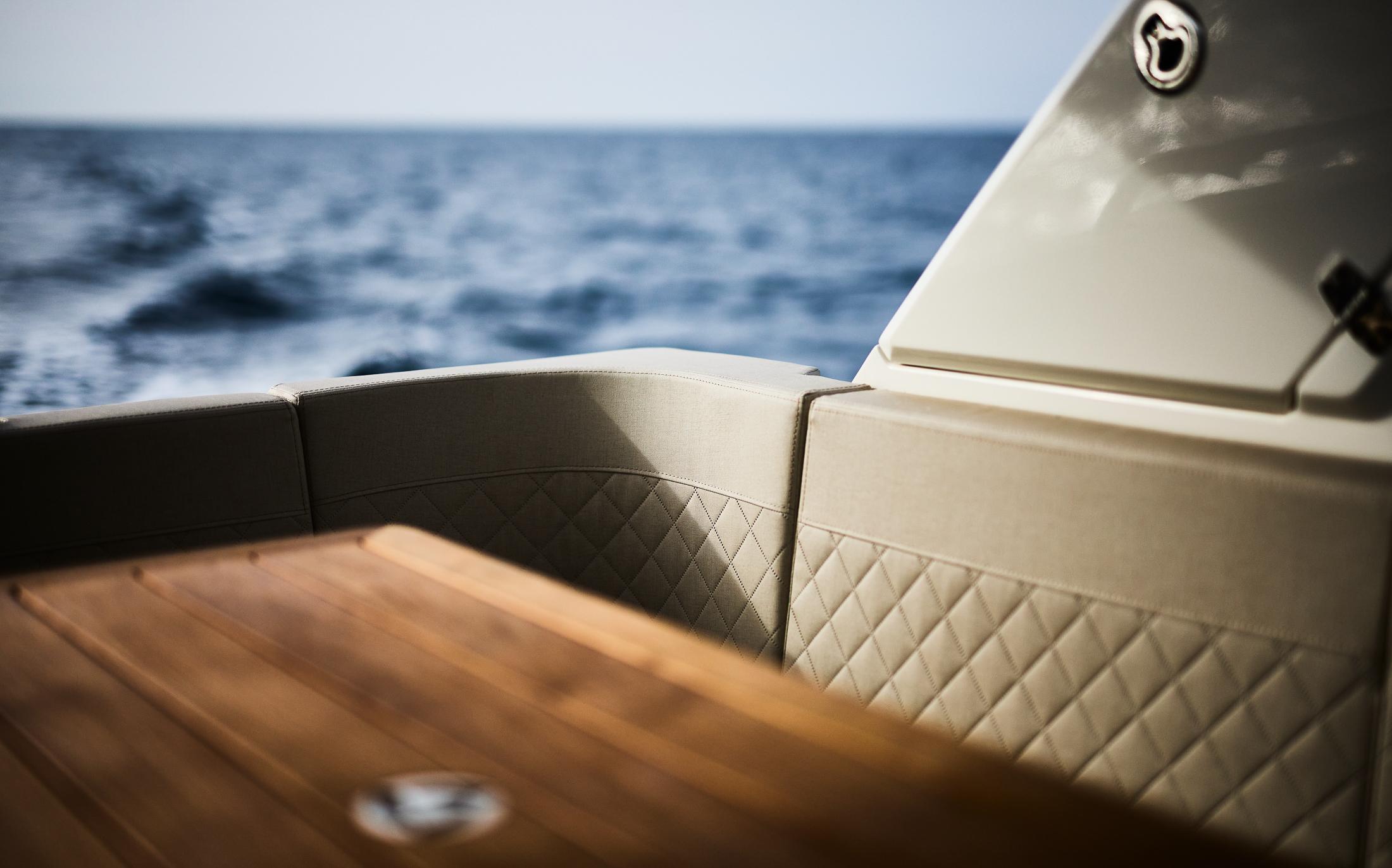 Skamander-Sorrento 2025 -FL-US-Luxurious Skamander Sorrento 2025 yacht interior with quilted seating and wooden table, ocean view.-9722985 | Thumbnail