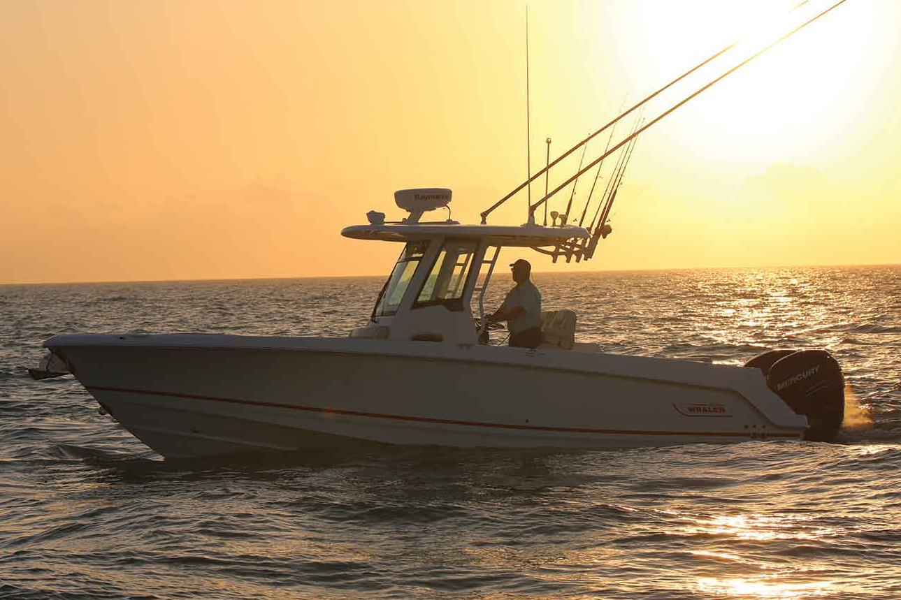 Manufacturer Provided Image: 2017 Boston Whaler 280 Outrage boat cruising at sunset.