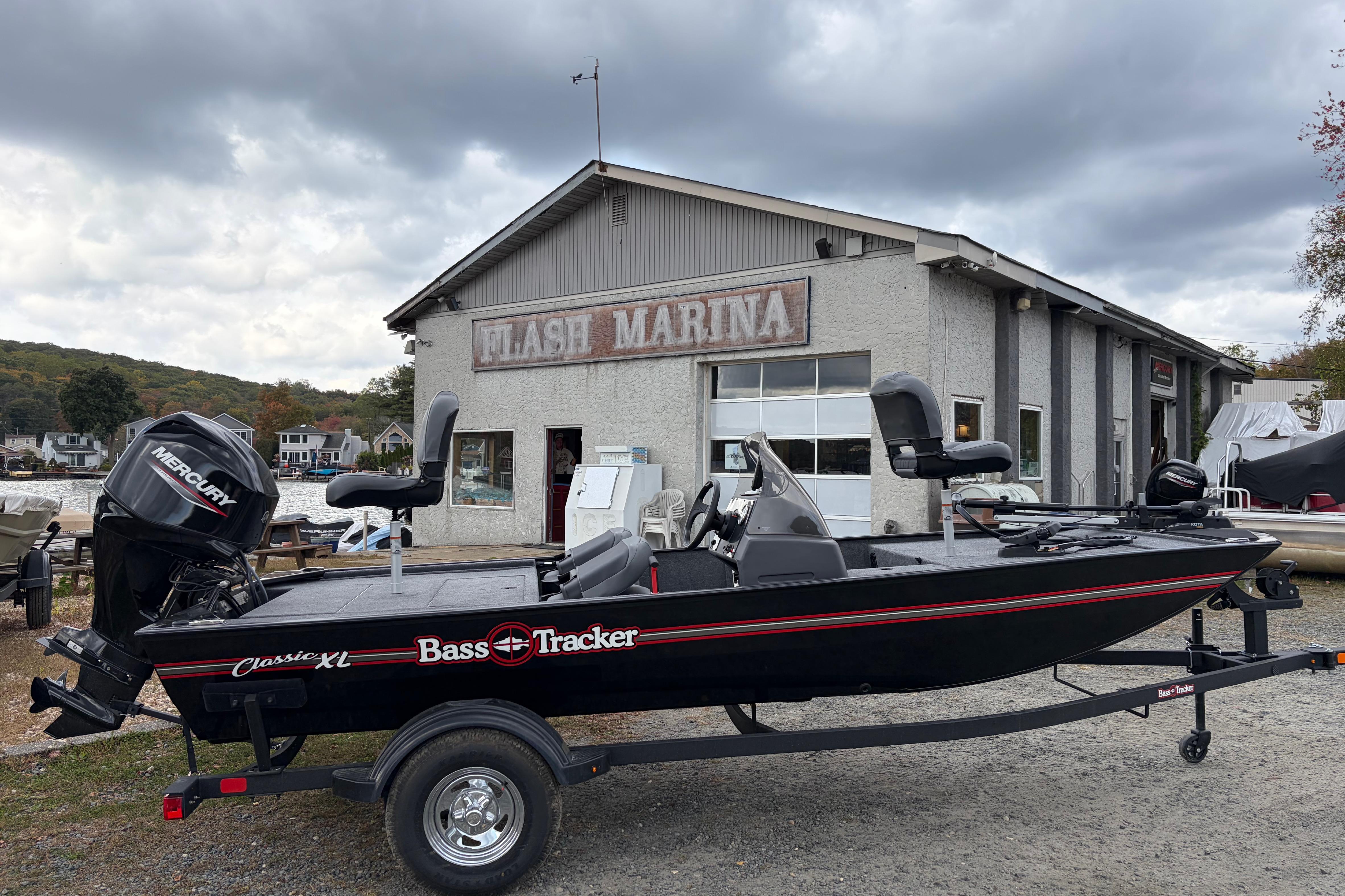 2026 Tracker Bass Tracker Classic XL boat at Flash Marina under cloudy skies.