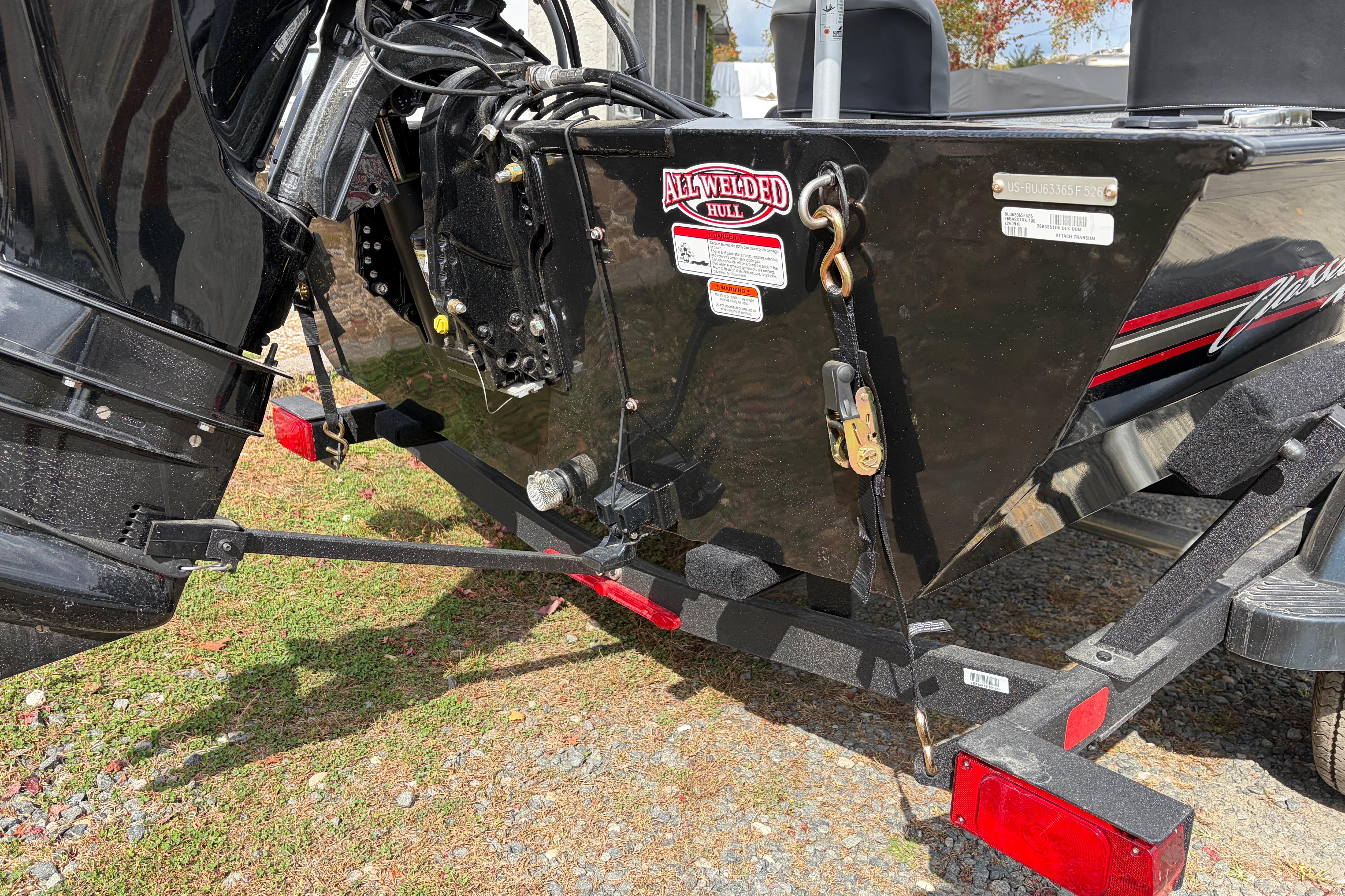 2026 Tracker Bass Tracker Classic XL boat trailer hitch and motor detail.