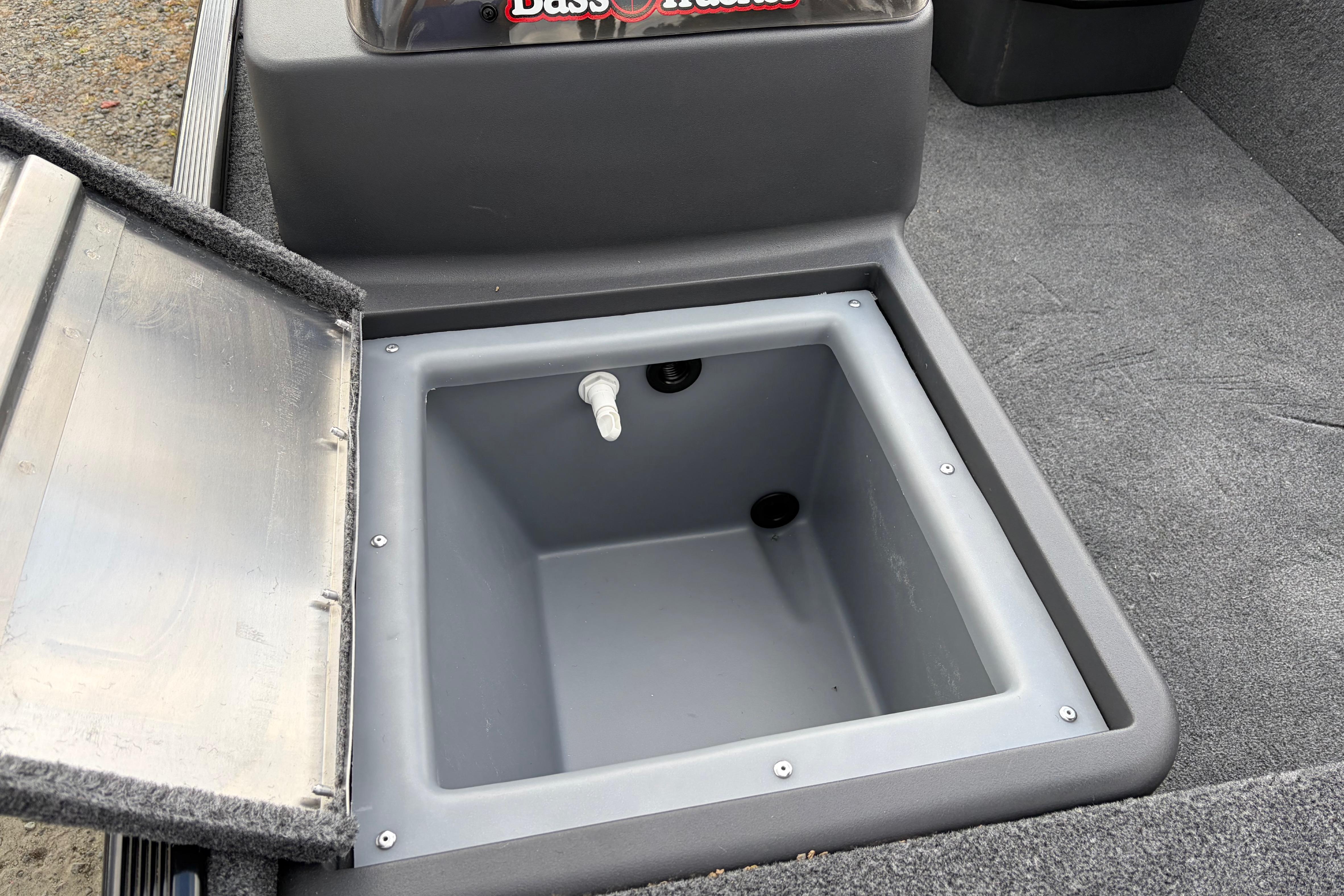 Open storage compartment in 2026 Tracker Bass Tracker Classic XL boat.