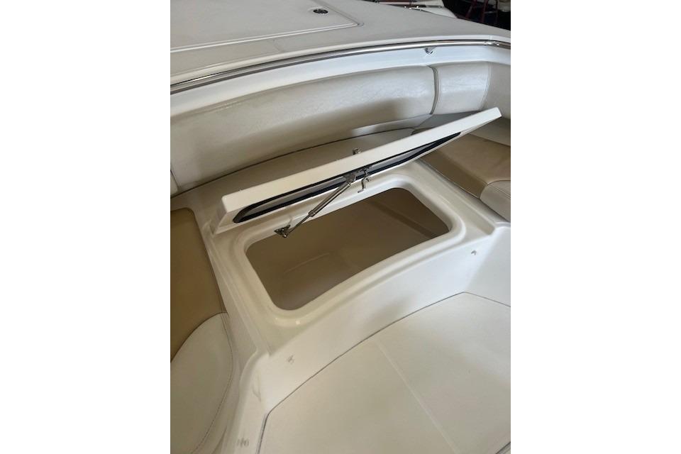 Open storage compartment on 2017 Boston Whaler 280 Outrage boat.
