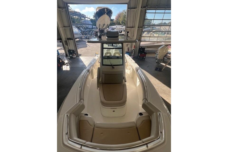 2017 Boston Whaler 280 Outrage boat interior in a garage setting.