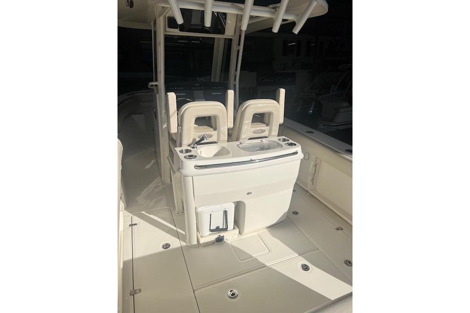 2017 Boston Whaler 280 Outrage boat interior with seating and console.