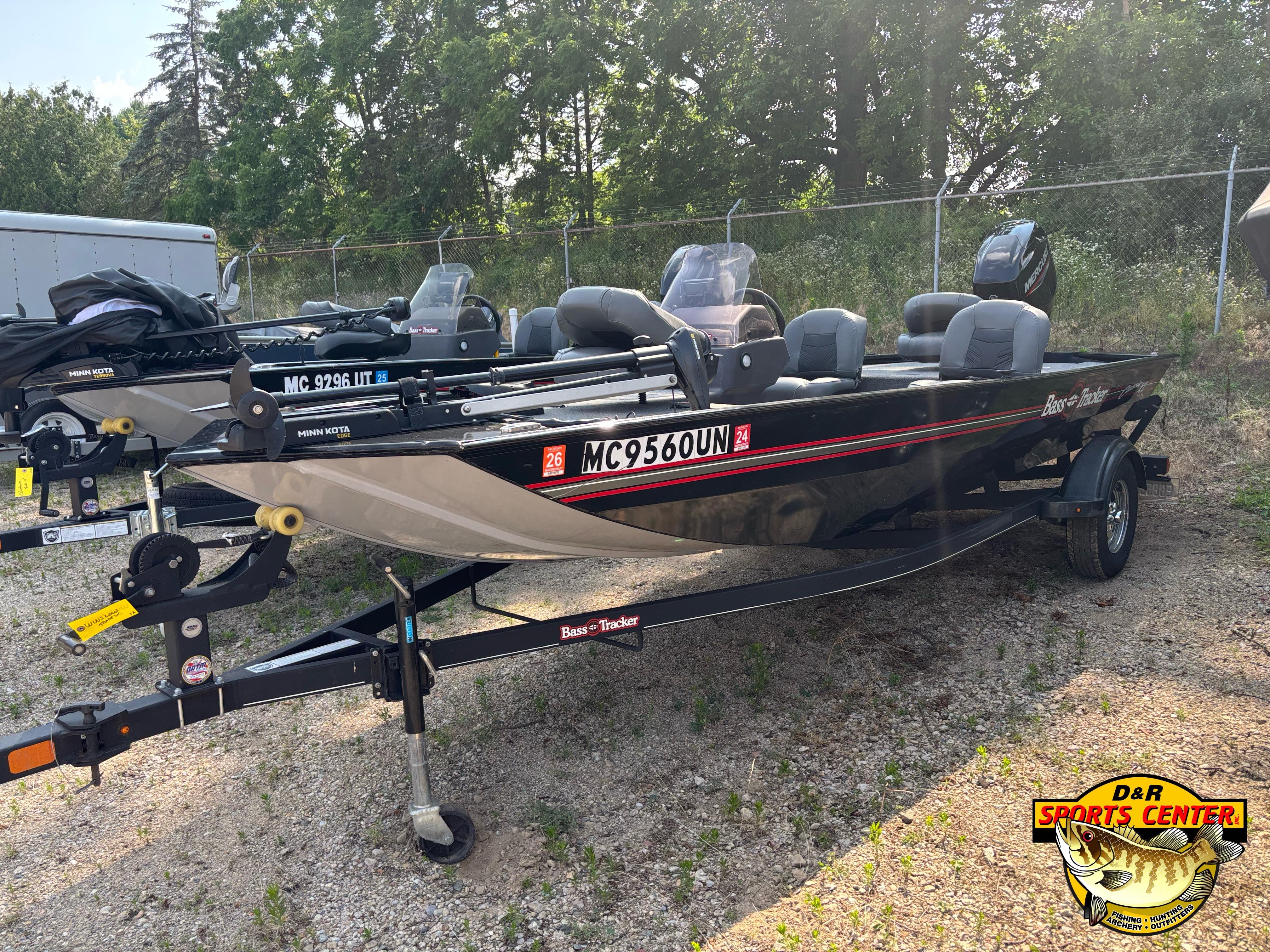 2021 Tracker Bass Tracker Classic XL boat on trailer, parked outdoors.