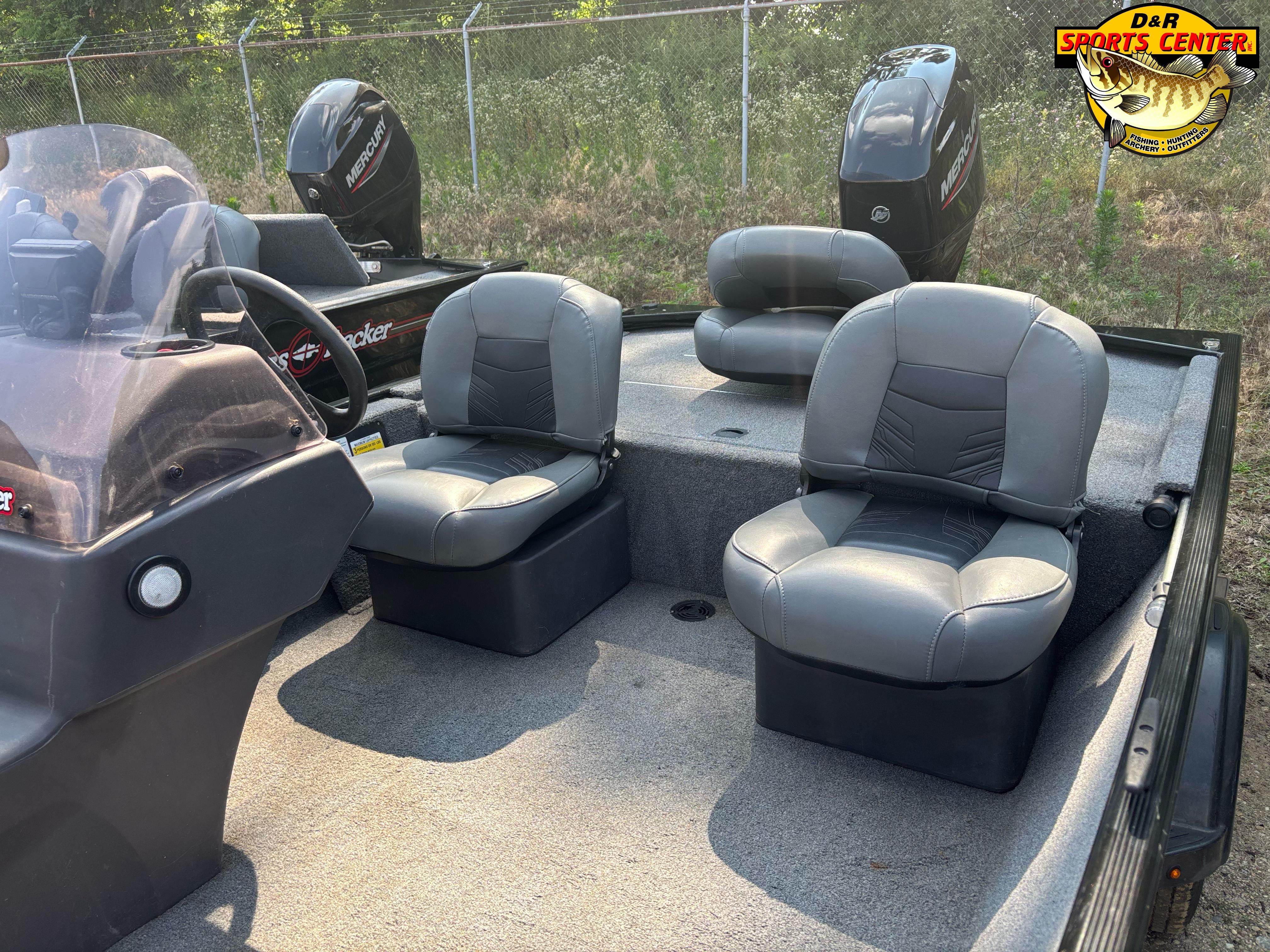 2021 Tracker Bass Tracker Classic XL boat interior with gray seats and steering console.