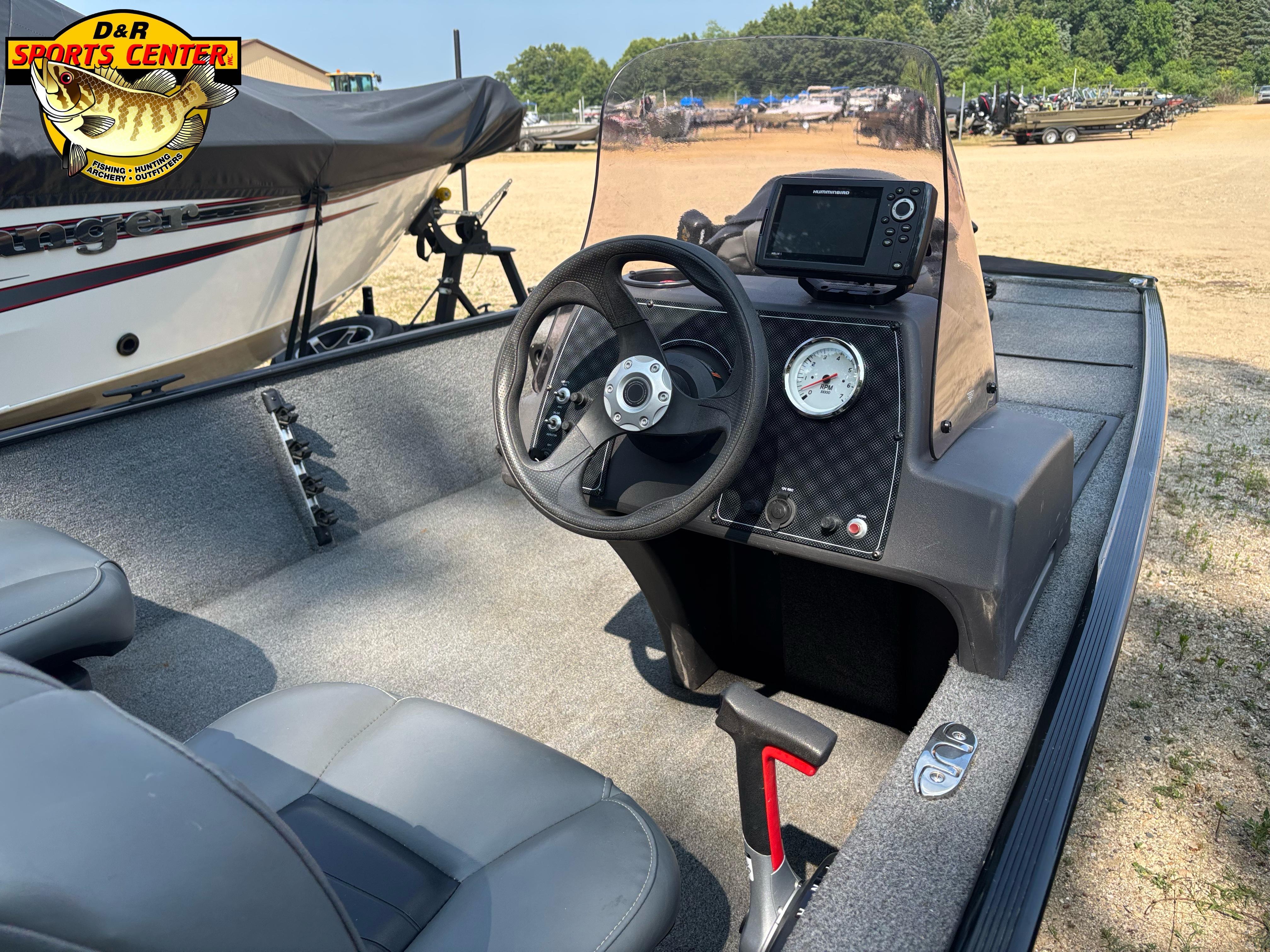 2021 Tracker Bass Tracker Classic XL boat interior with steering wheel and control panel.