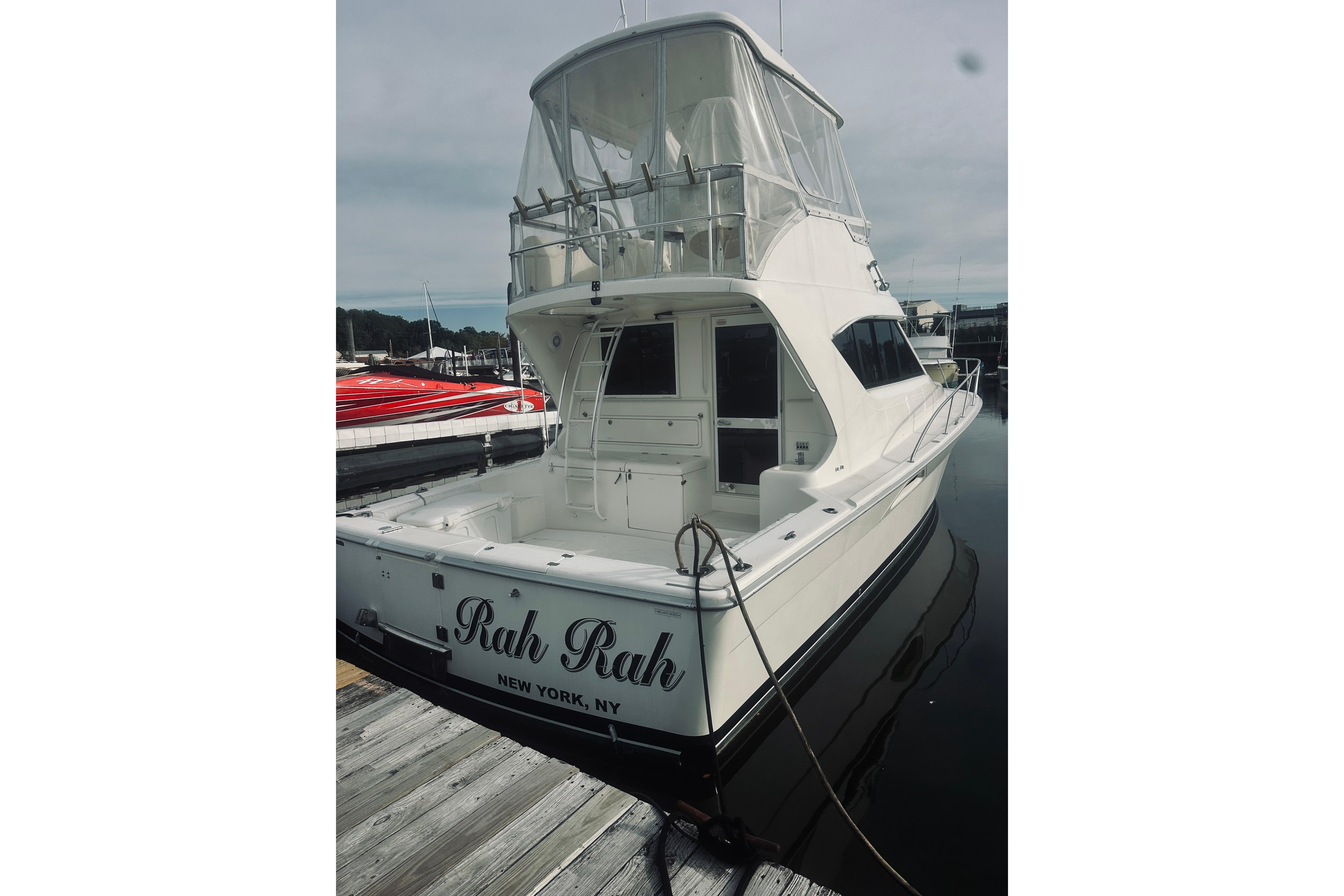 2000 Riviera 40 yacht docked in New York marina, named u0022Rah Rah.u0022
