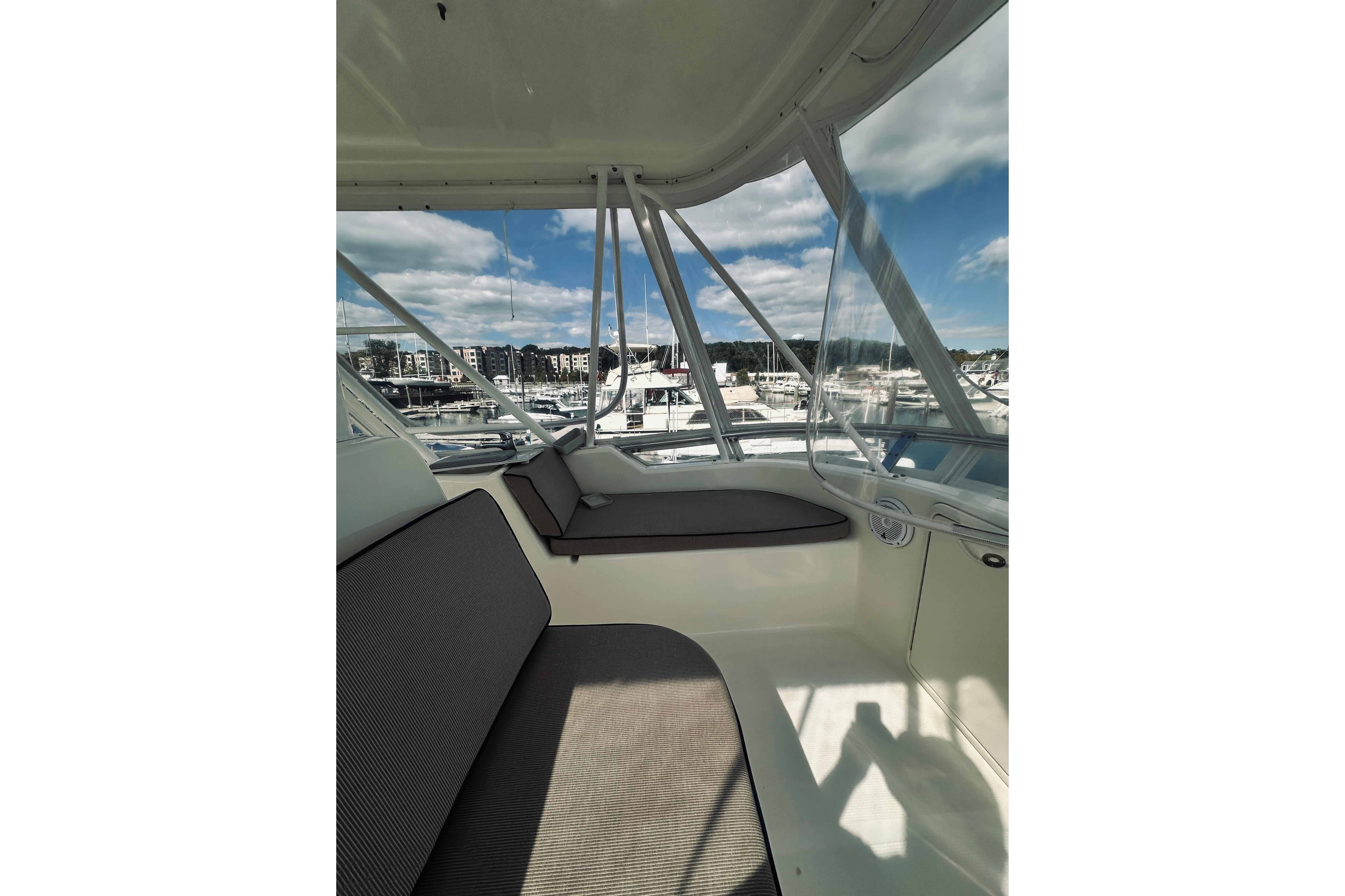 Interior view of a 2000 Riviera 40 yacht with marina background.