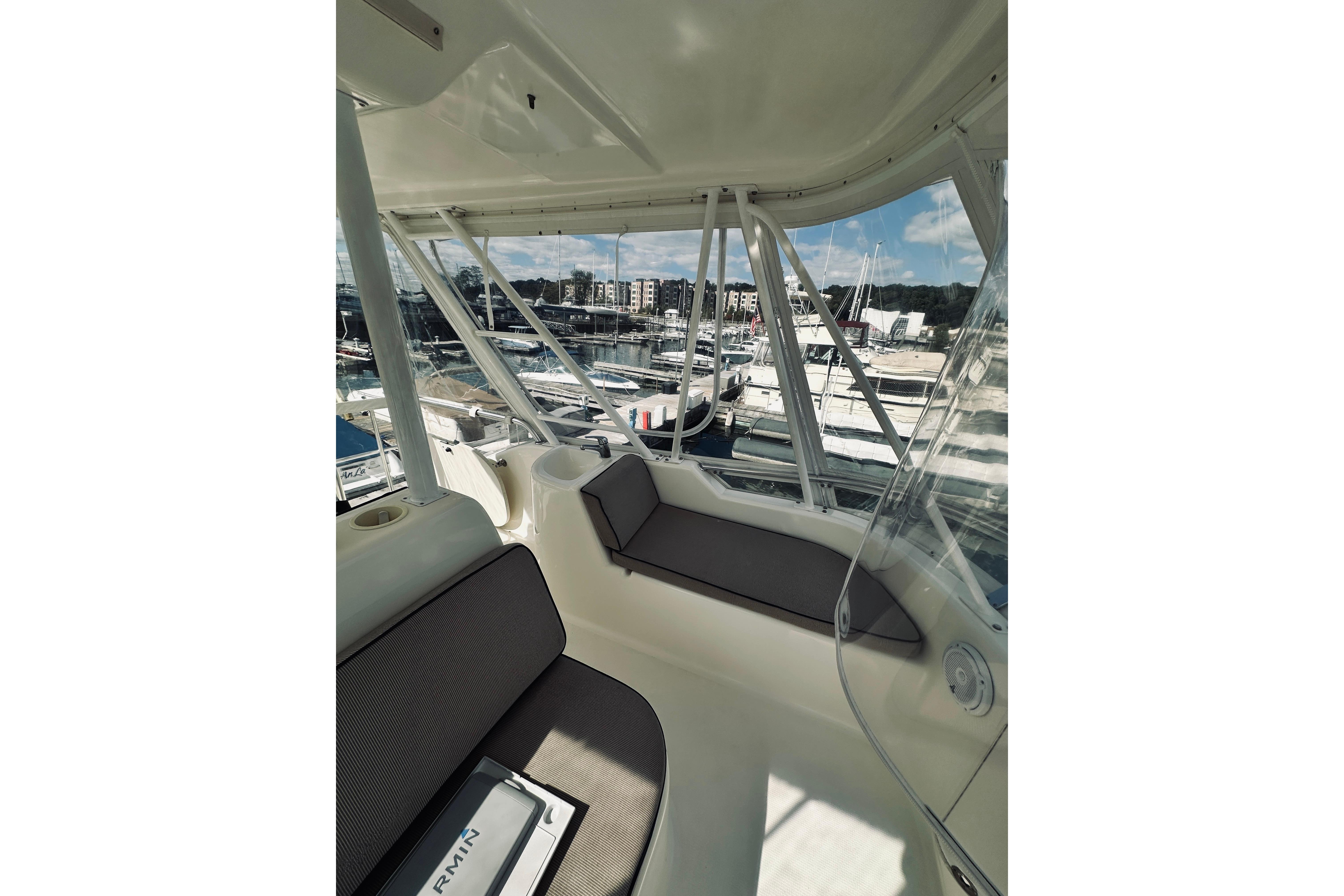 Interior view of 2000 Riviera 40 yacht with marina background.