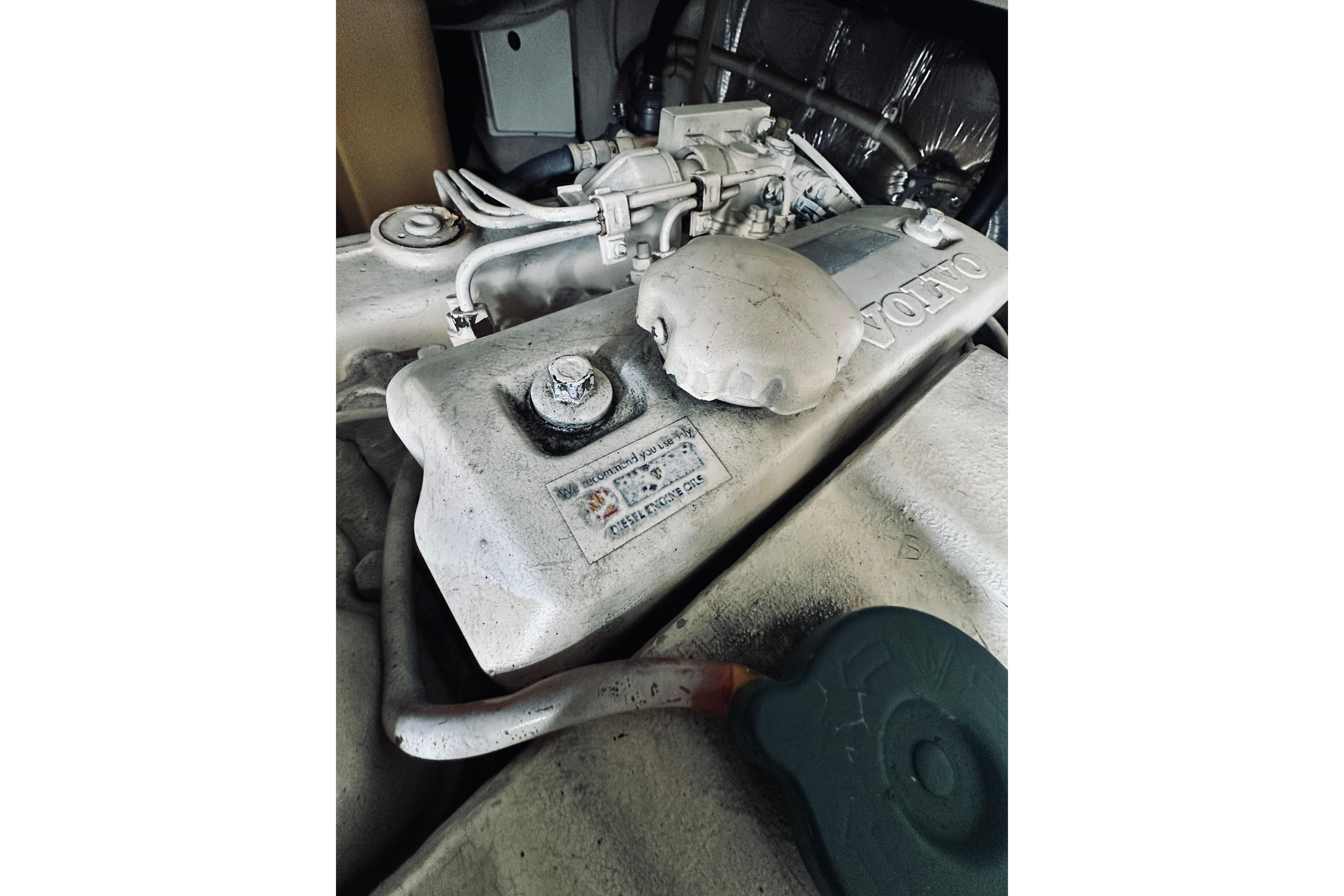 Engine compartment of a 2000 Riviera 40 boat, featuring a Volvo diesel engine.