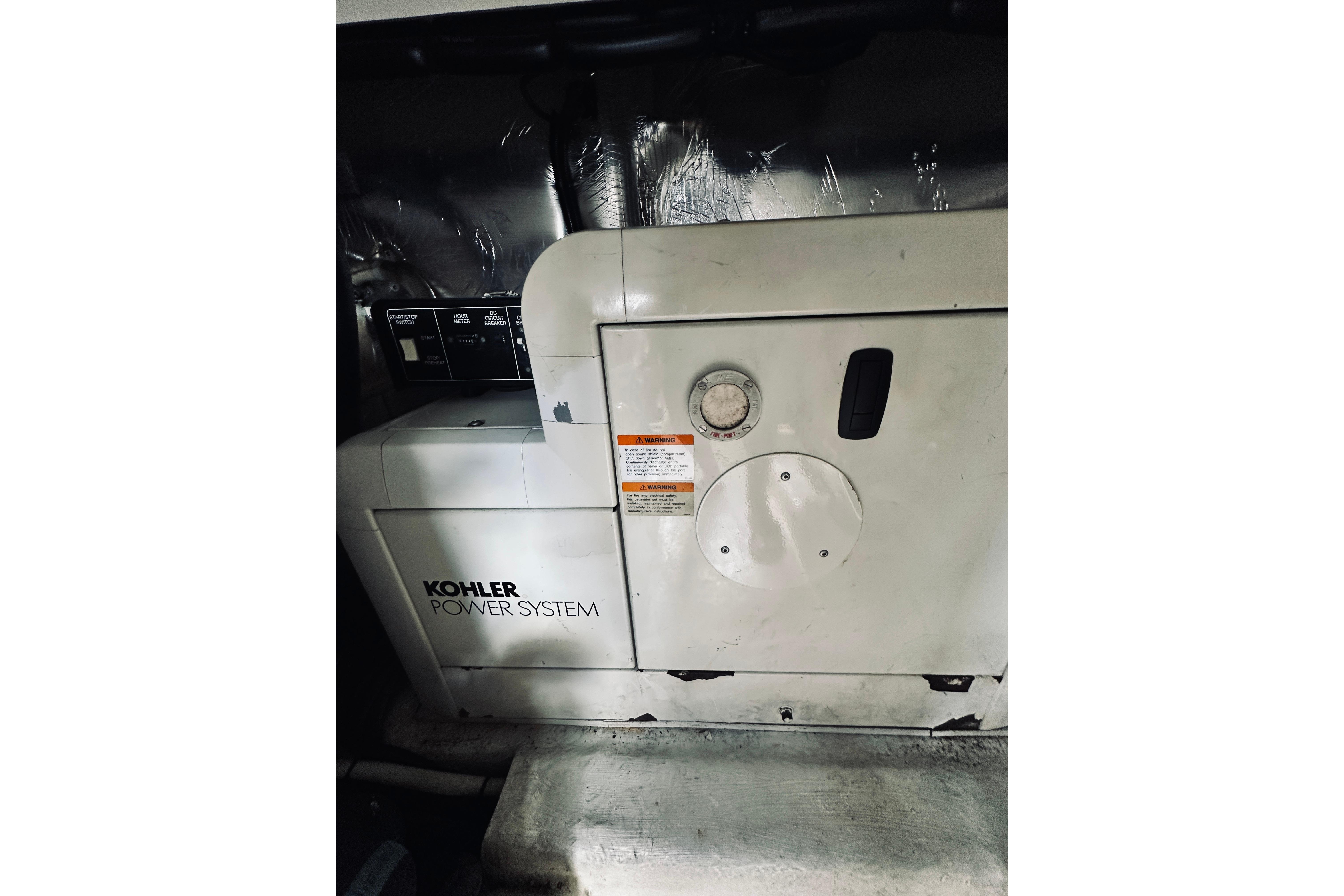 Kohler power system in 2000 Riviera 40 yacht engine room.