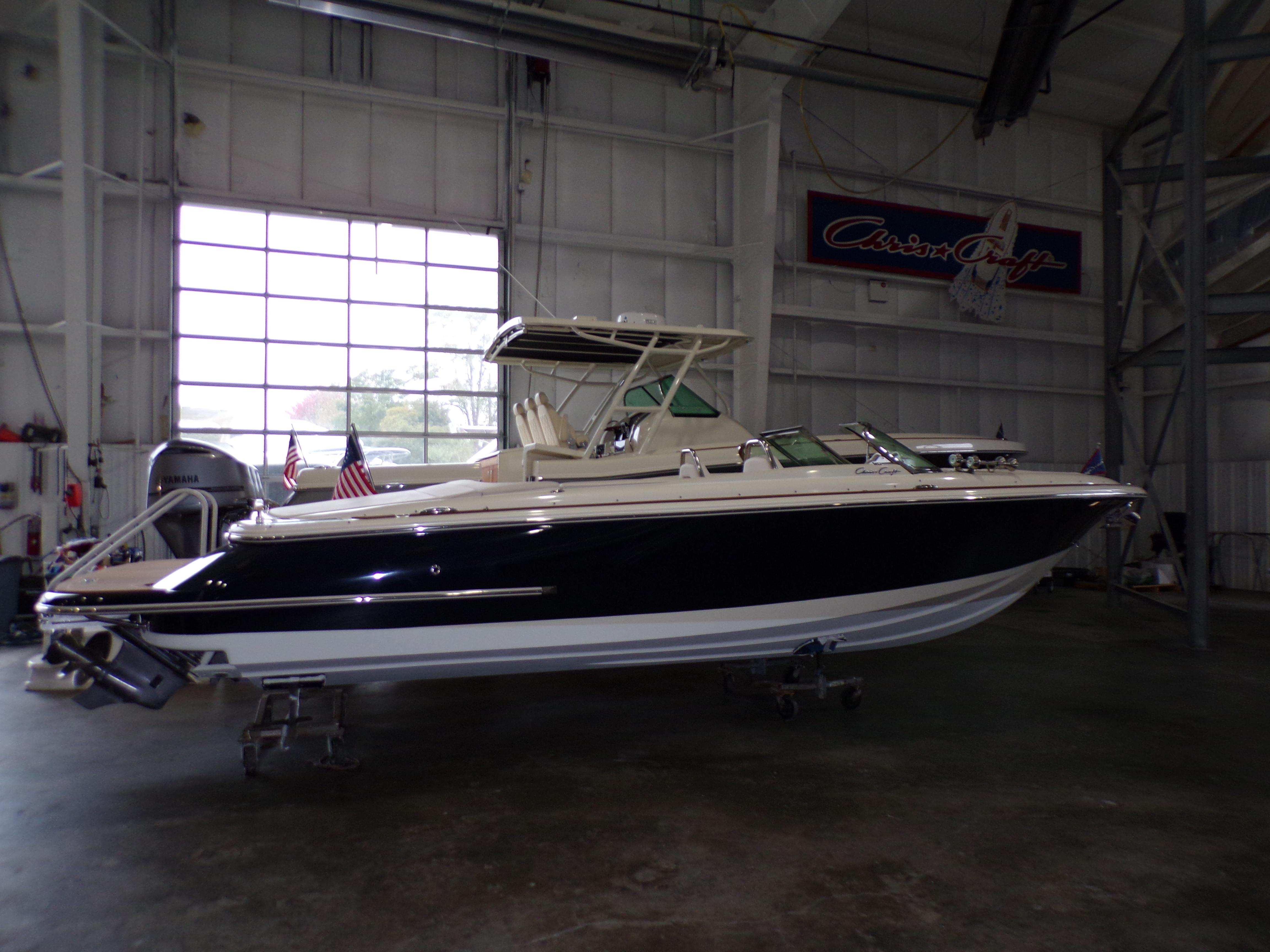 2021 Chris-Craft Launch 27 boat in a storage facility.